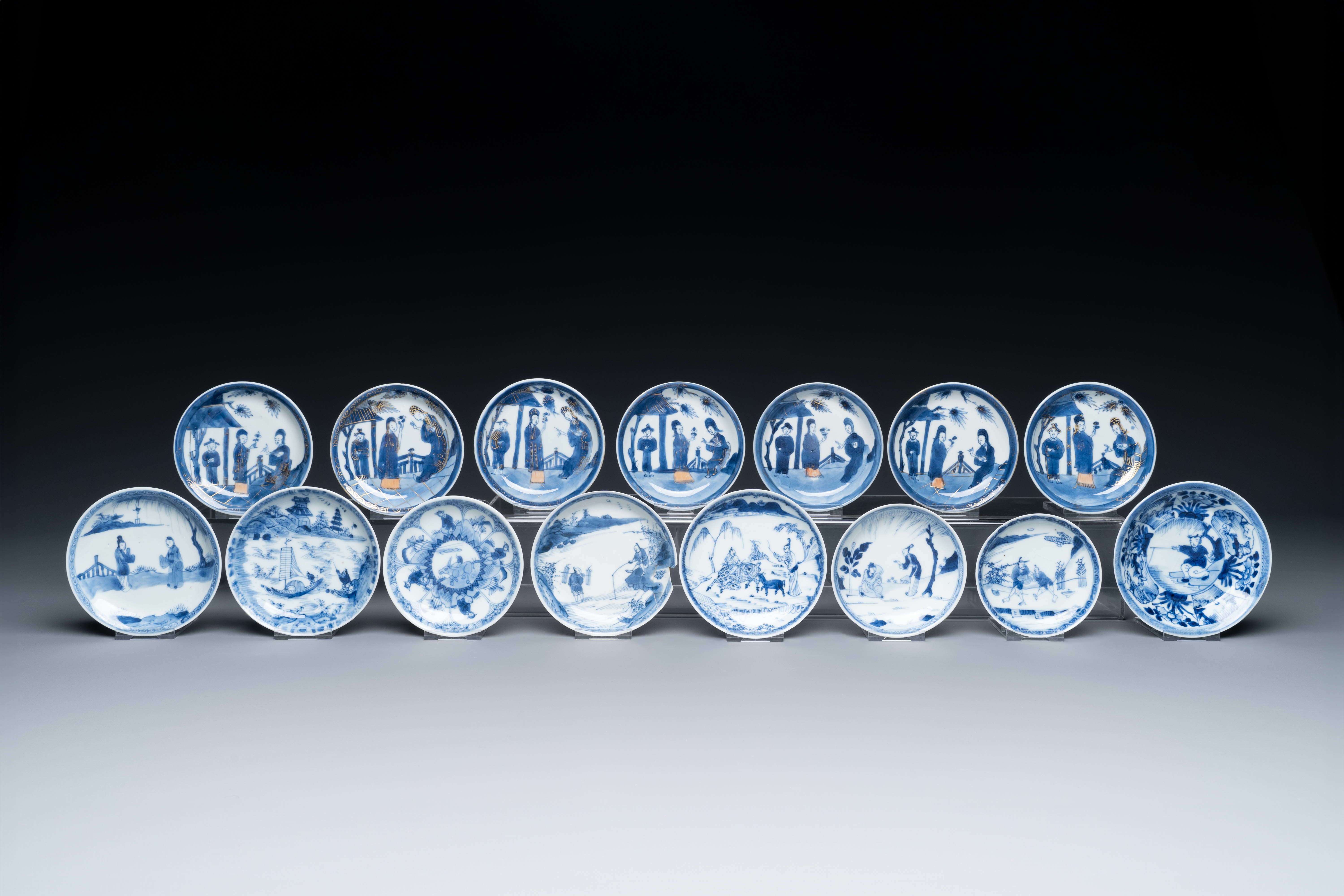 Thirteen Chinese blue and white saucers and twelve cups with figural design, Kangxi/Yongzheng - Image 2 of 11