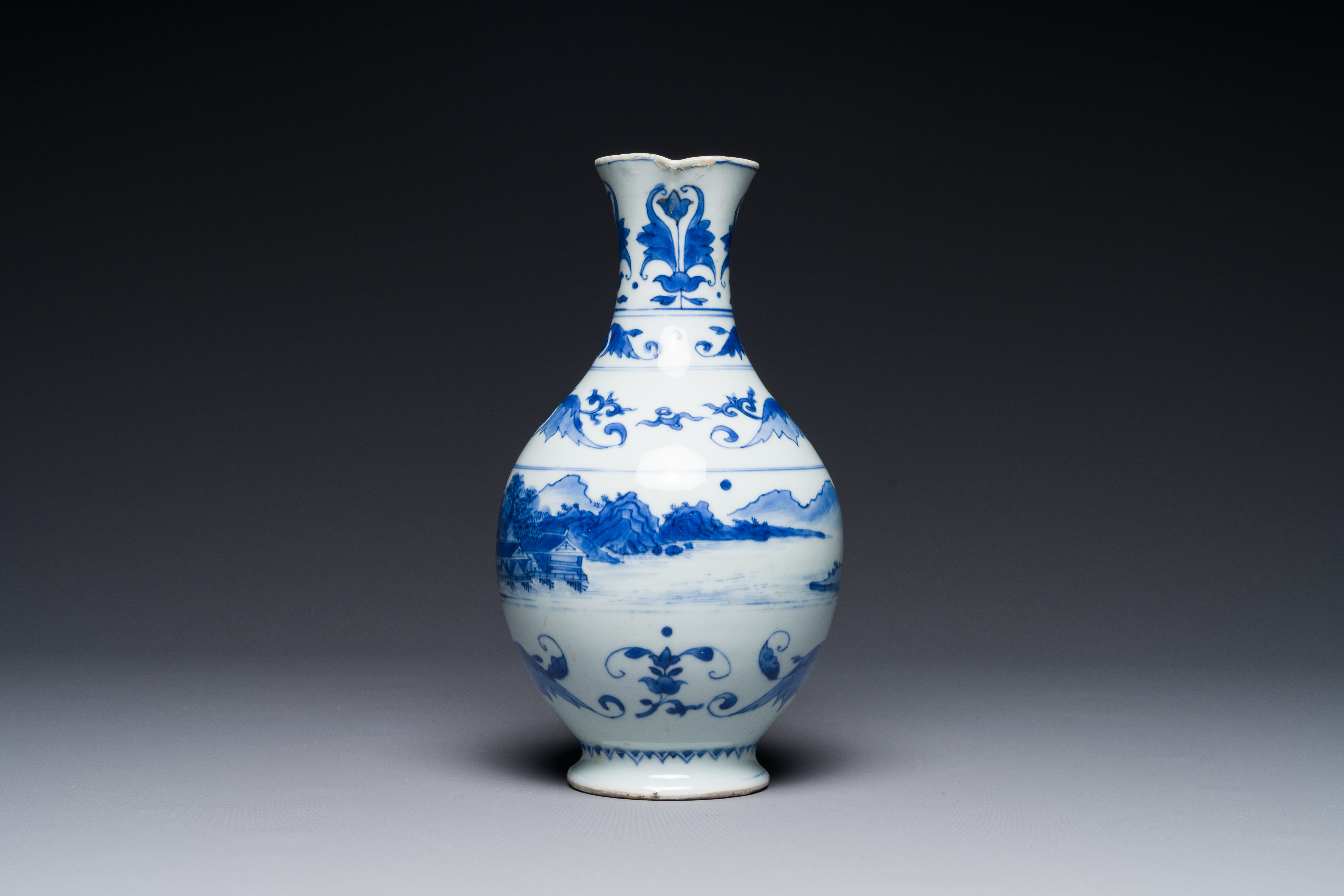 A Chinese blue and white ewer with landscape design, Transitional period - Image 2 of 4