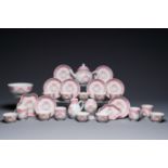 A 28-piece Chinese puce-enamelled and gilt armorial tea service with crowned monograms, Qianlong