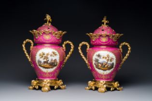 A pair of French parcel-gilt polychrome pink-ground porcelain potpourri vases, Jacob Petit, Paris, 1