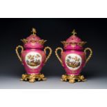 A pair of French parcel-gilt polychrome pink-ground porcelain potpourri vases, Jacob Petit, Paris, 1