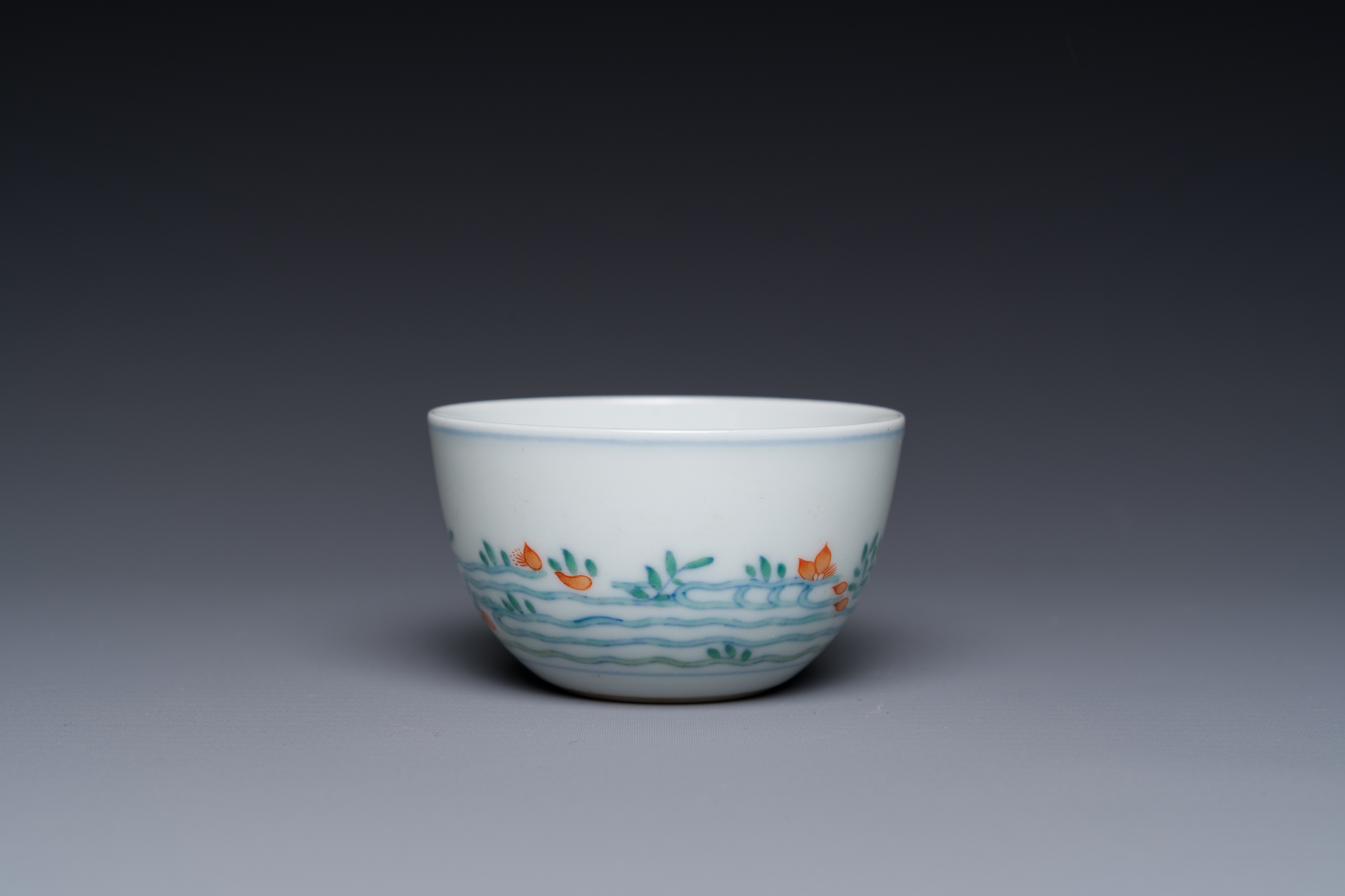 A Chinese doucai 'goldfish' cup, Cai Hua Tang Zhi å½©è¯å ‚è£½ mark, 18th C.