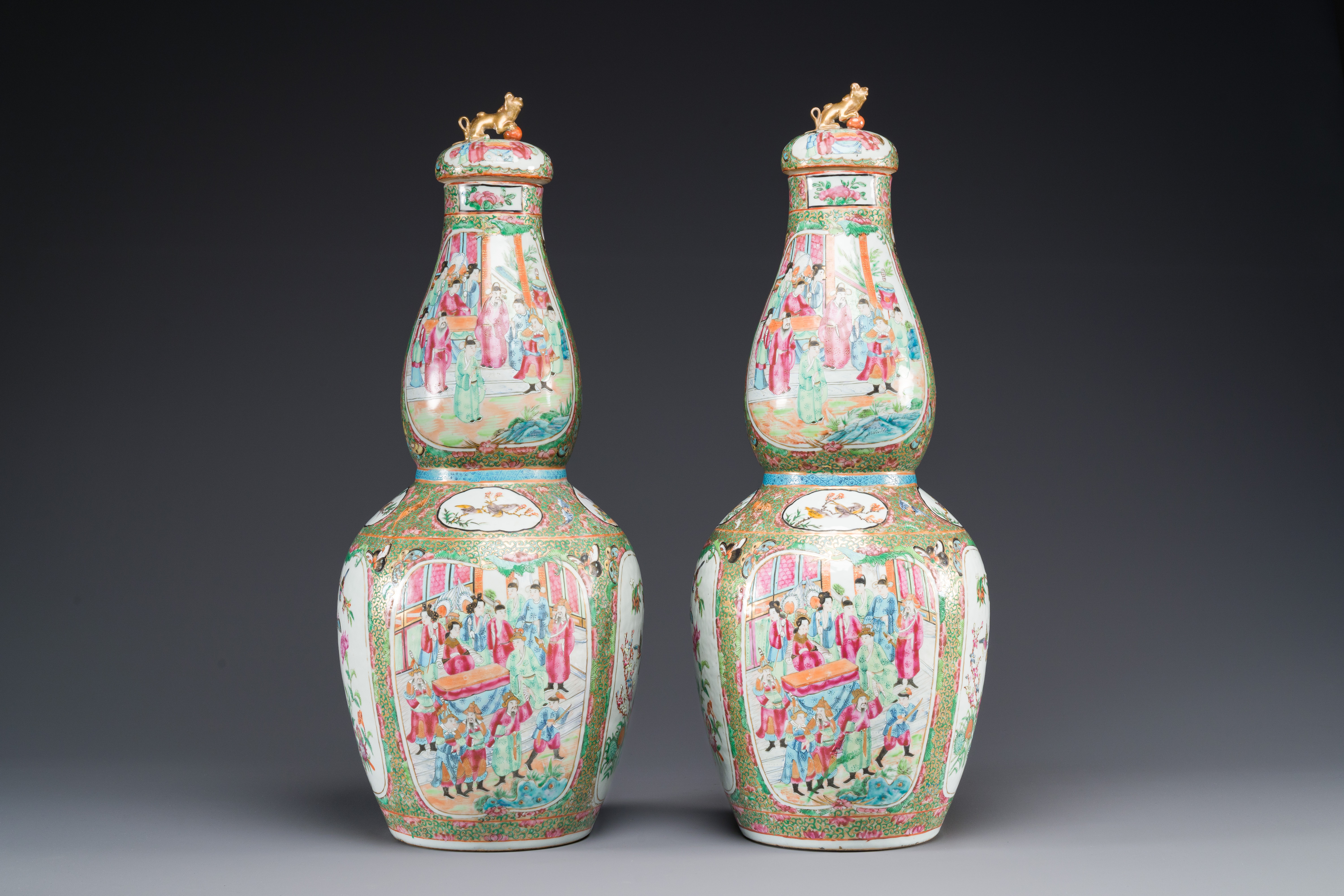 A pair of Chinese Canton famille rose double gourd vases and covers, 19th C. - Image 3 of 6