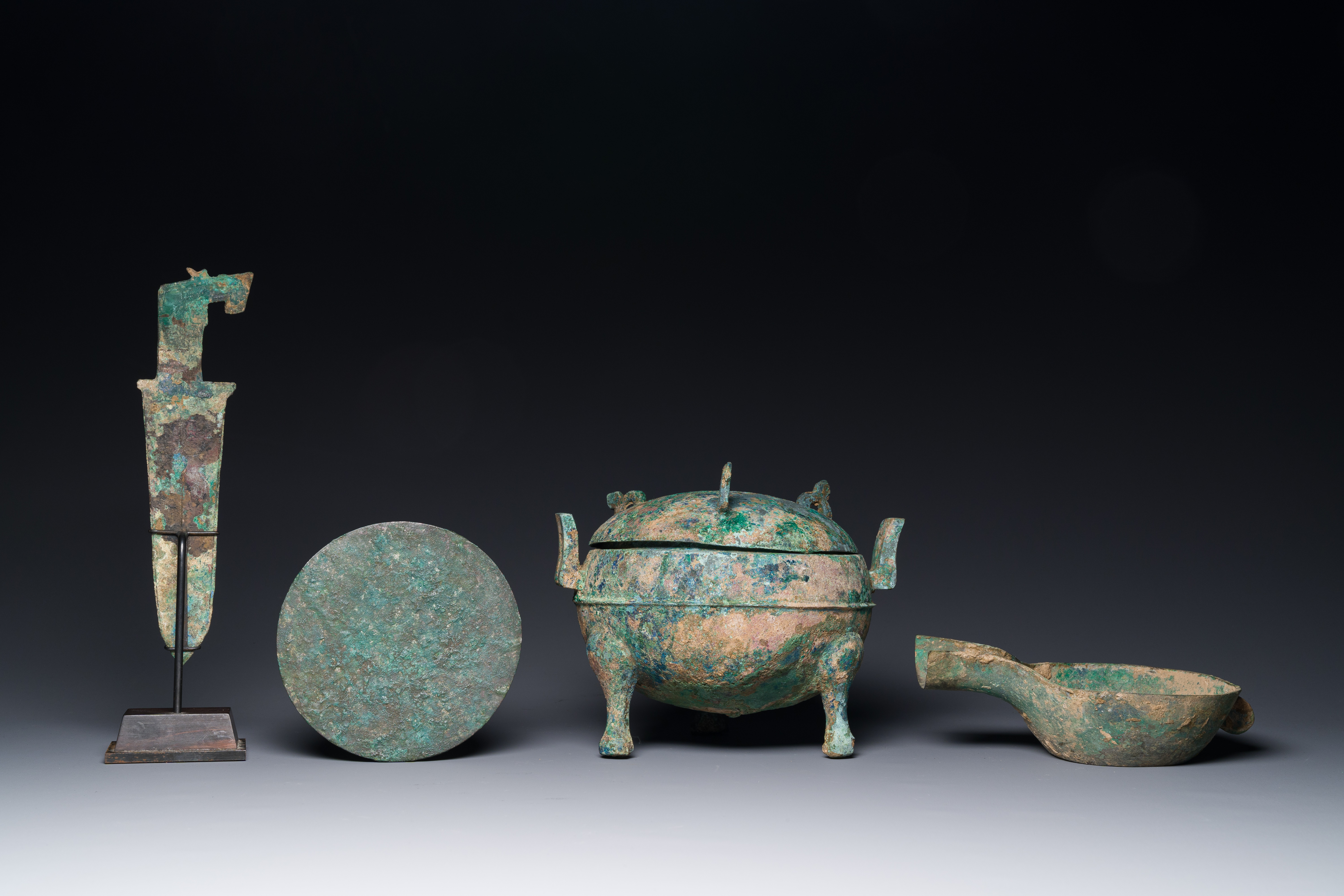 A group of four Chinese archaic bronze wares, late Shang, Warring States and Han - Image 7 of 12