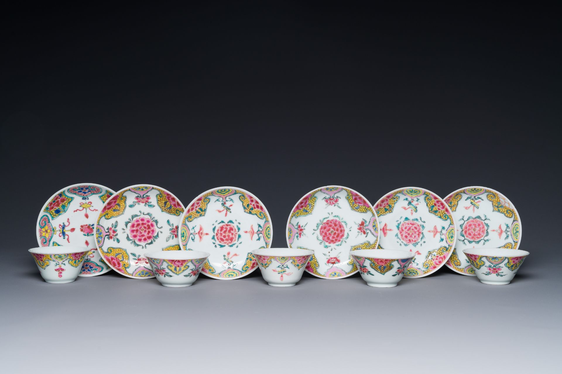 Five Chinese famille rose cups and six saucers with floral decor, Yongzheng/Qianlong