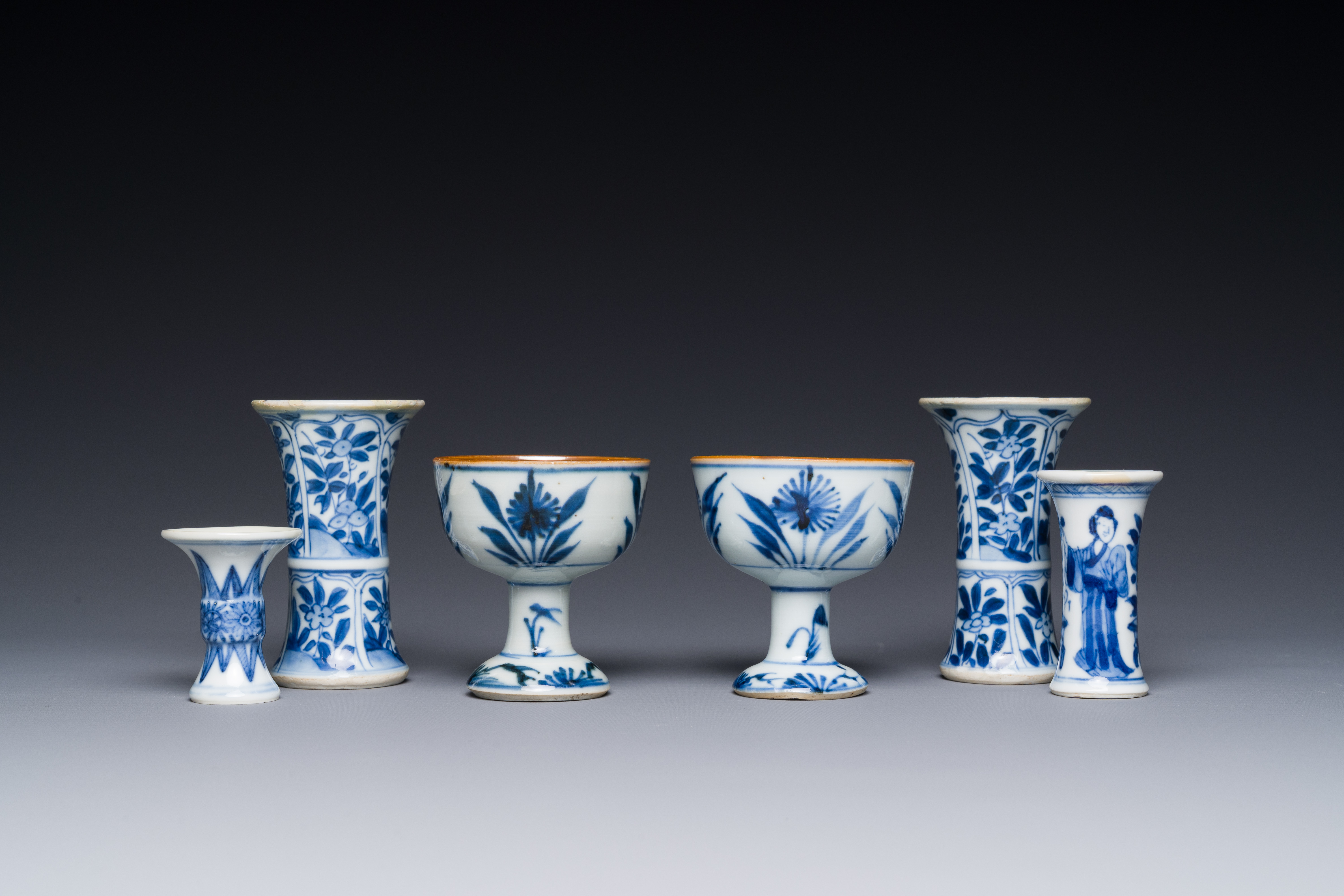 Two Chinese blue and white stem cups and four miniature 'gu' vases, Kangxi - Image 2 of 6