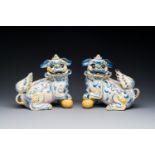 A pair of Portuguese polychrome faience sculptures of lions, 17/18th C.