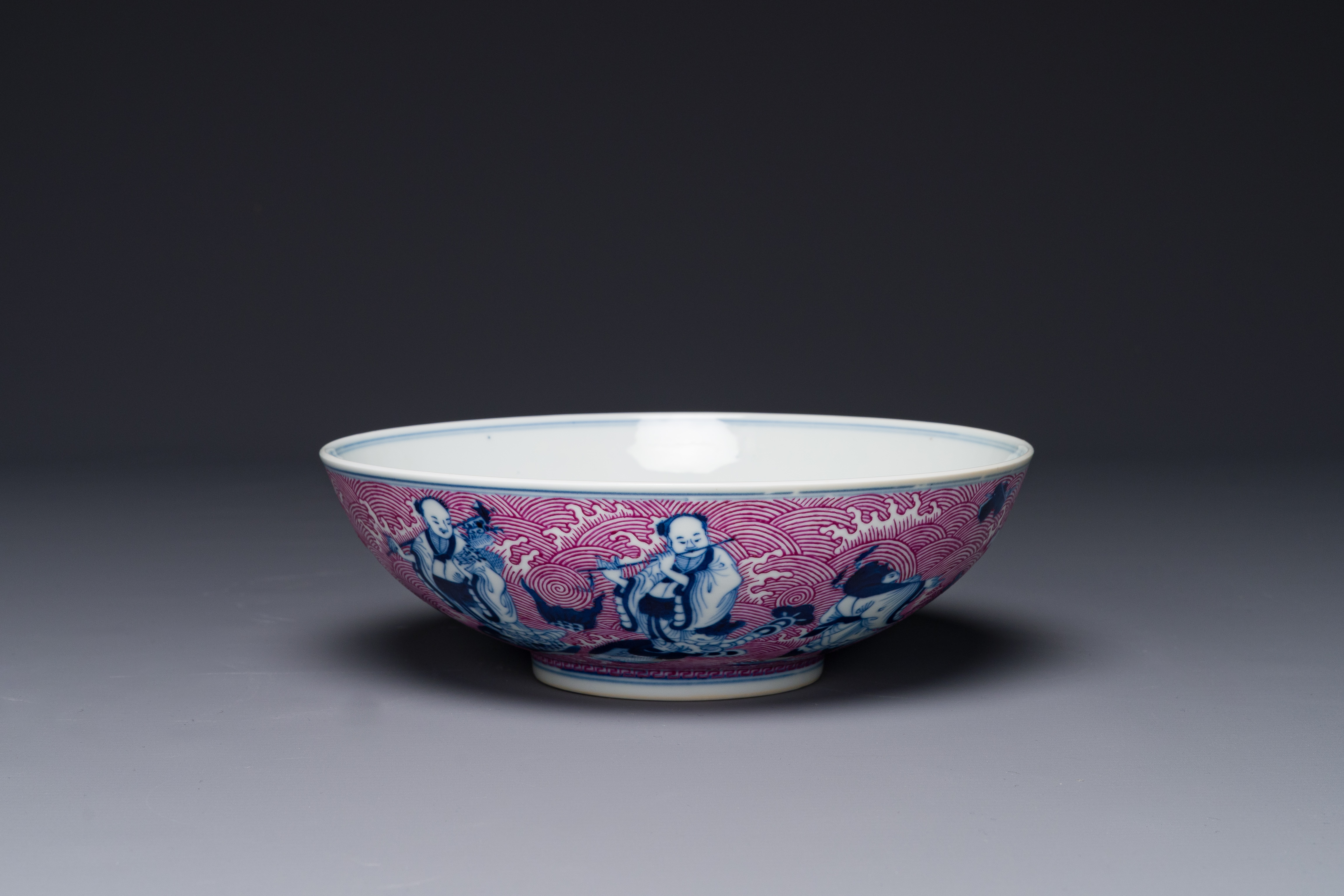 A Chinese blue, white and puce-enamelled 'Eight Immortals' bowl, Guangxu mark and of the period - Image 2 of 8