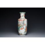 A Chinese famille verte rouleau vase with narrative design, 19th C.