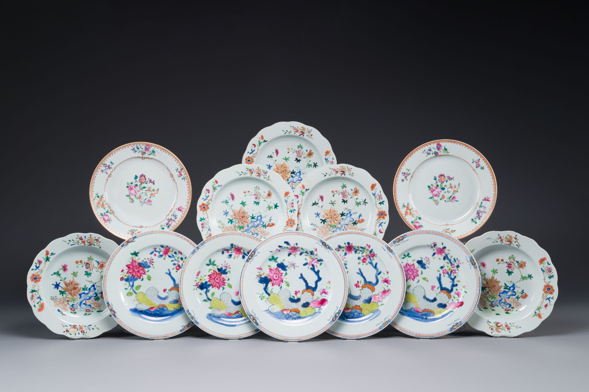 Twelve Chinese famille rose plates with floral design, Qianlong