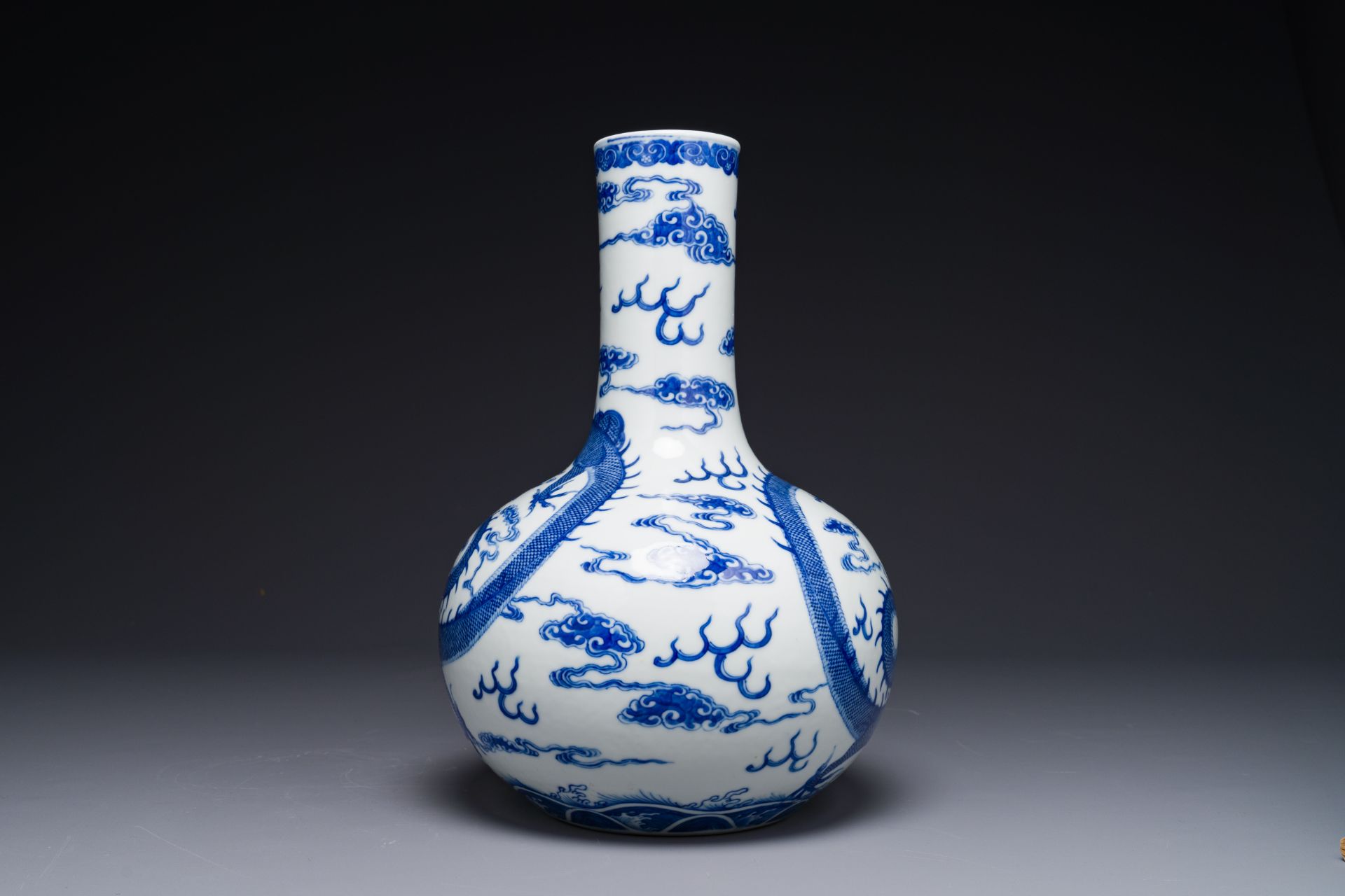 A Chinese blue and white 'dragon' bottle vase, Yongzheng mark, 19th C. - Image 2 of 6