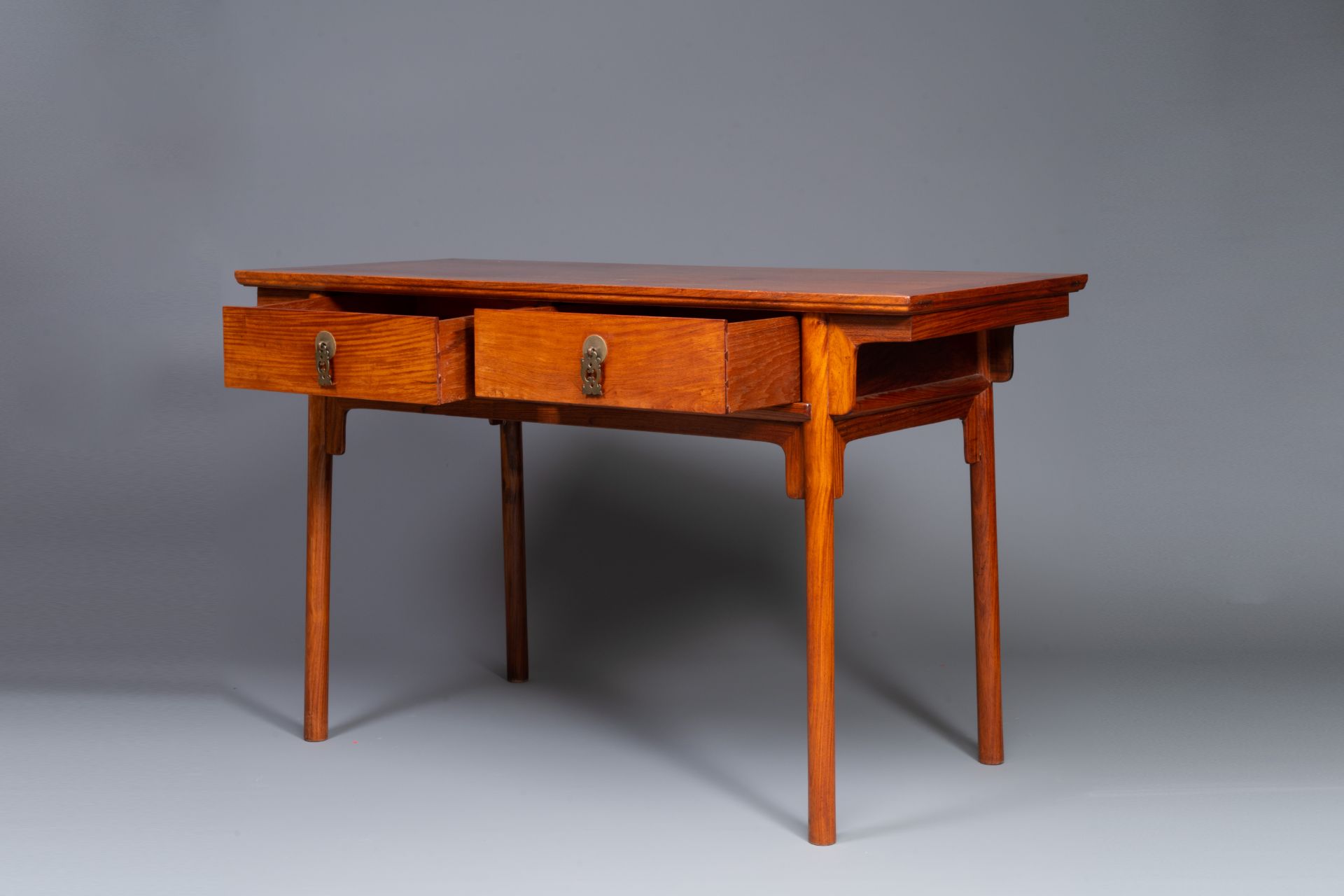 A Chinese huanghuali wooden two-drawer recessed-leg table, 19/20th C. - Image 2 of 13