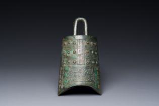 A rare Chinese inscribed archaic bronze bell, Eastern Zhou