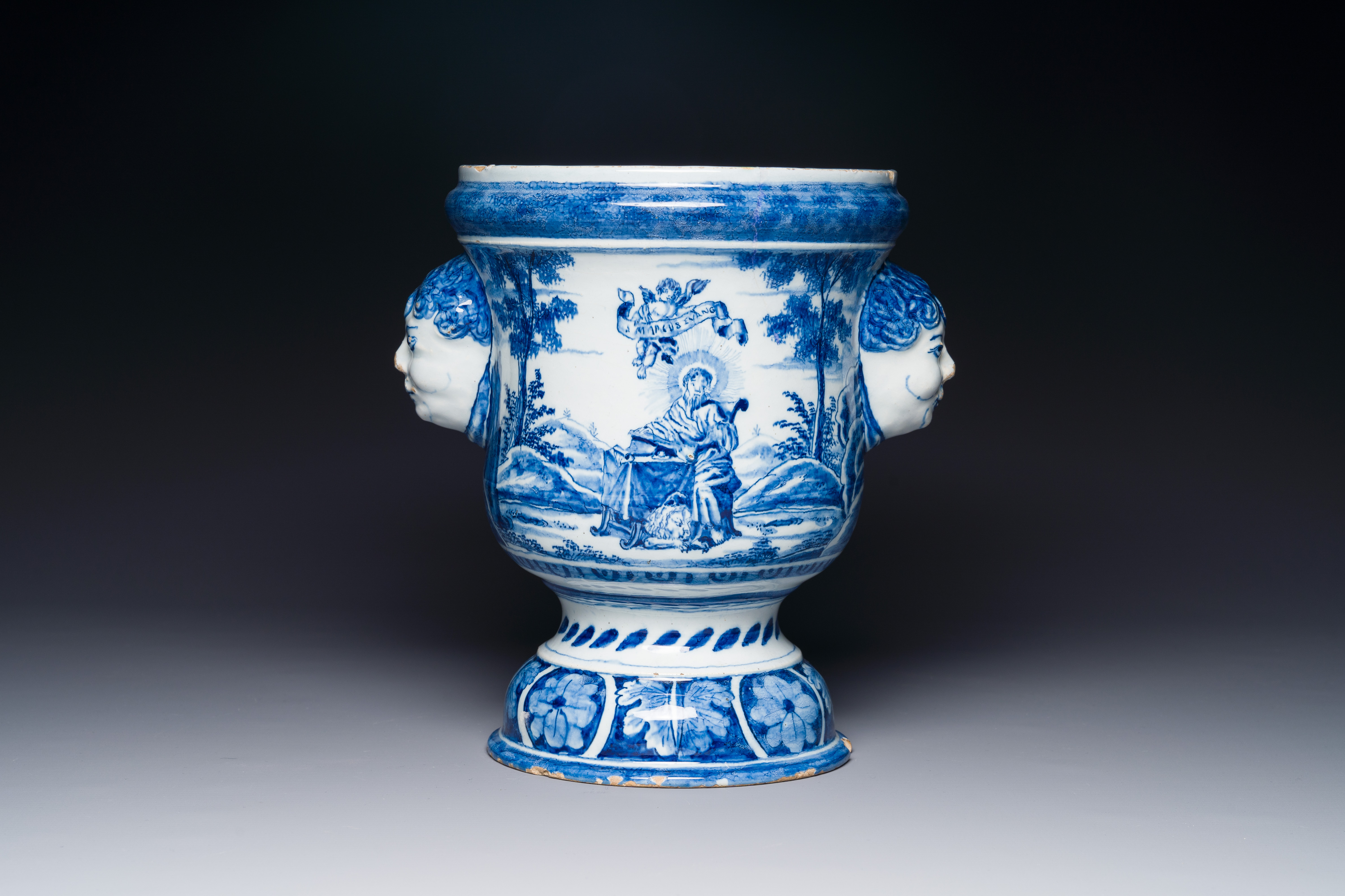 A Dutch Delft blue and white jardiniere depicting Saint Willibrord and John the Baptist, 18th C. - Image 2 of 7