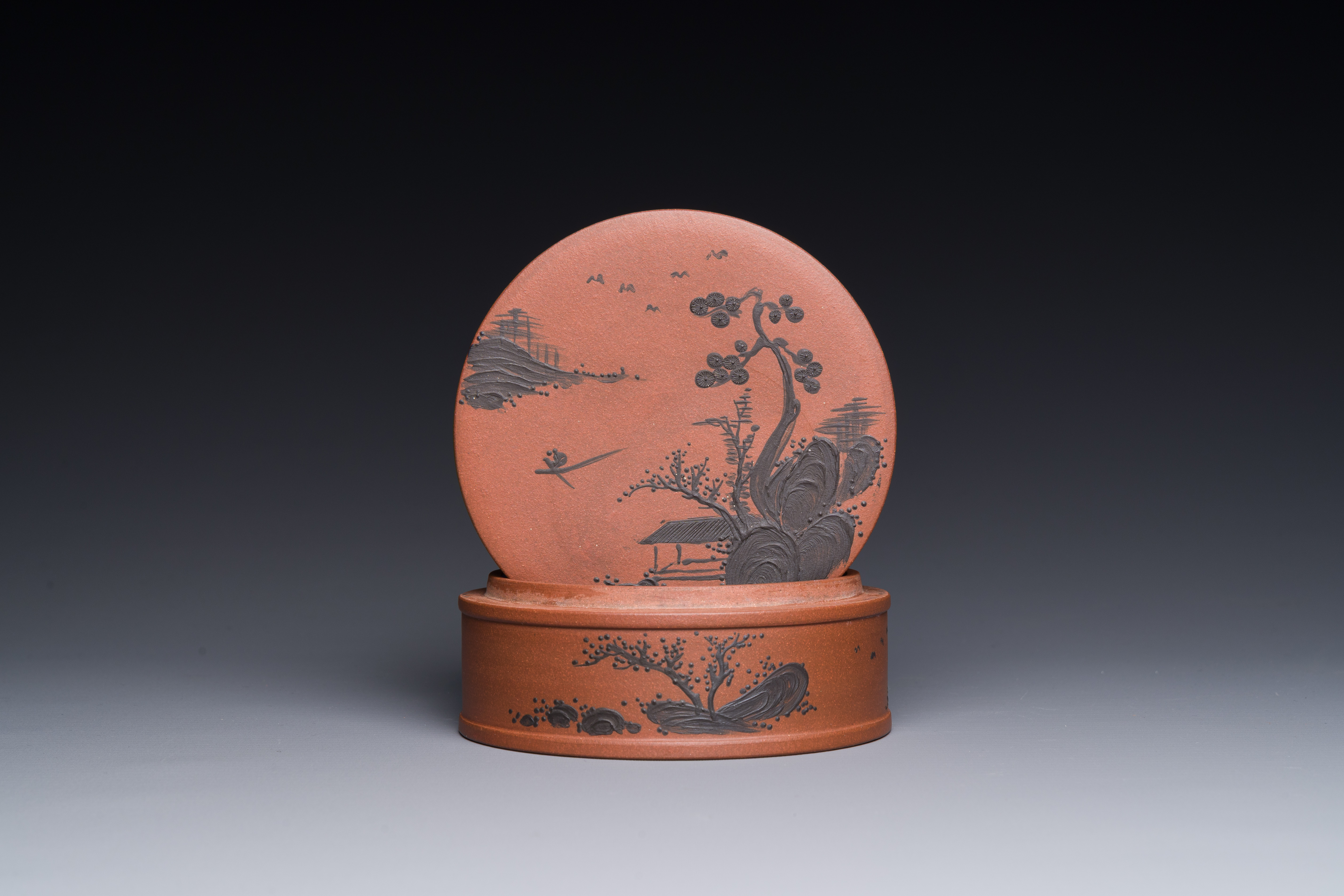 A Chinese blue-enameled Yixing stoneware box and cover with a mountainous landscape, 18/19th C. - Image 2 of 5