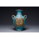 A Chinese 'robin's egg and imitation bronze'-glazed 'hu' vase, Qianlong mark, 19th C.