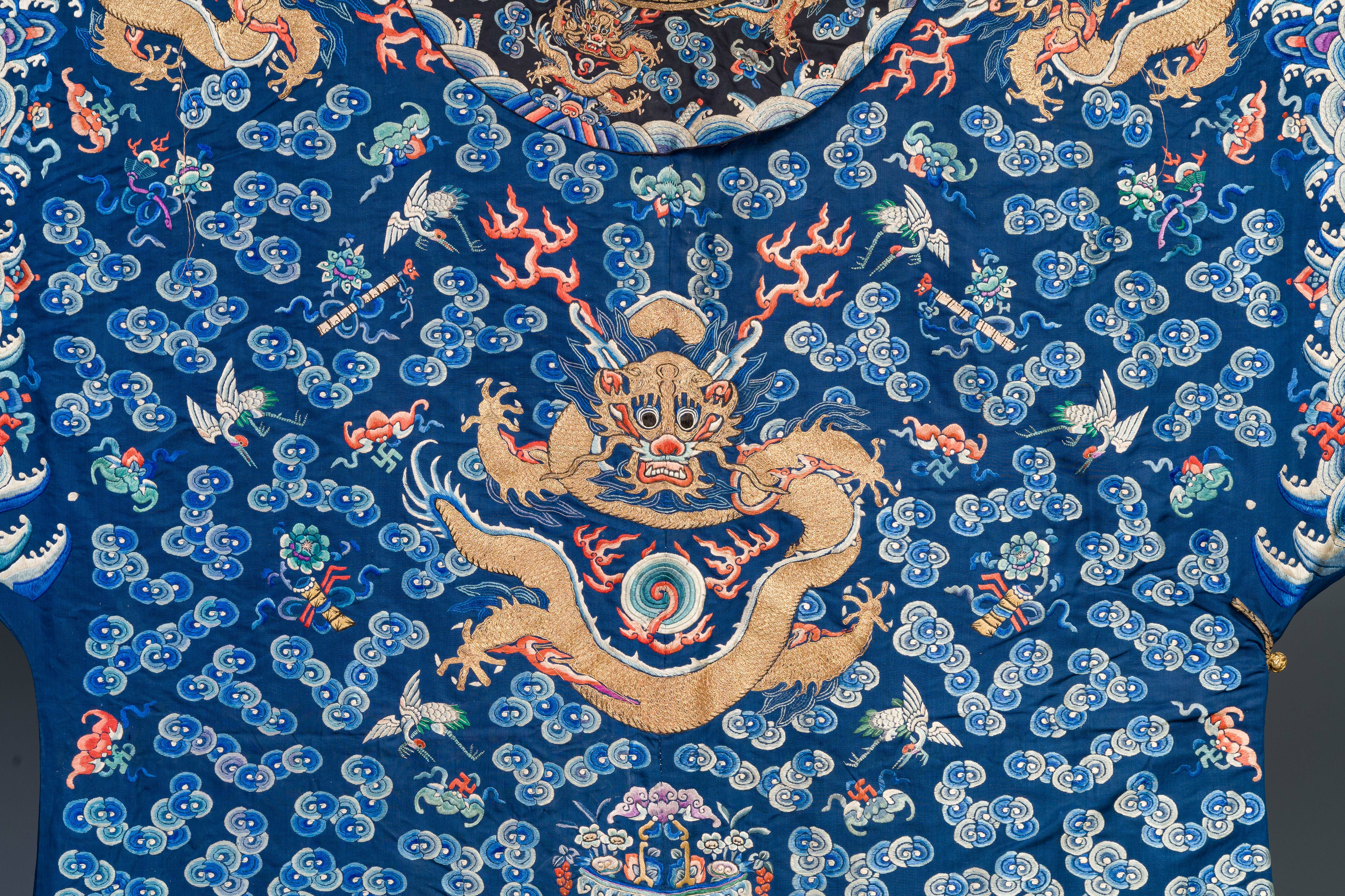 A Chinese gold thread embroidered blue-ground silk 'dragon' robe, 19th C. - Image 4 of 7