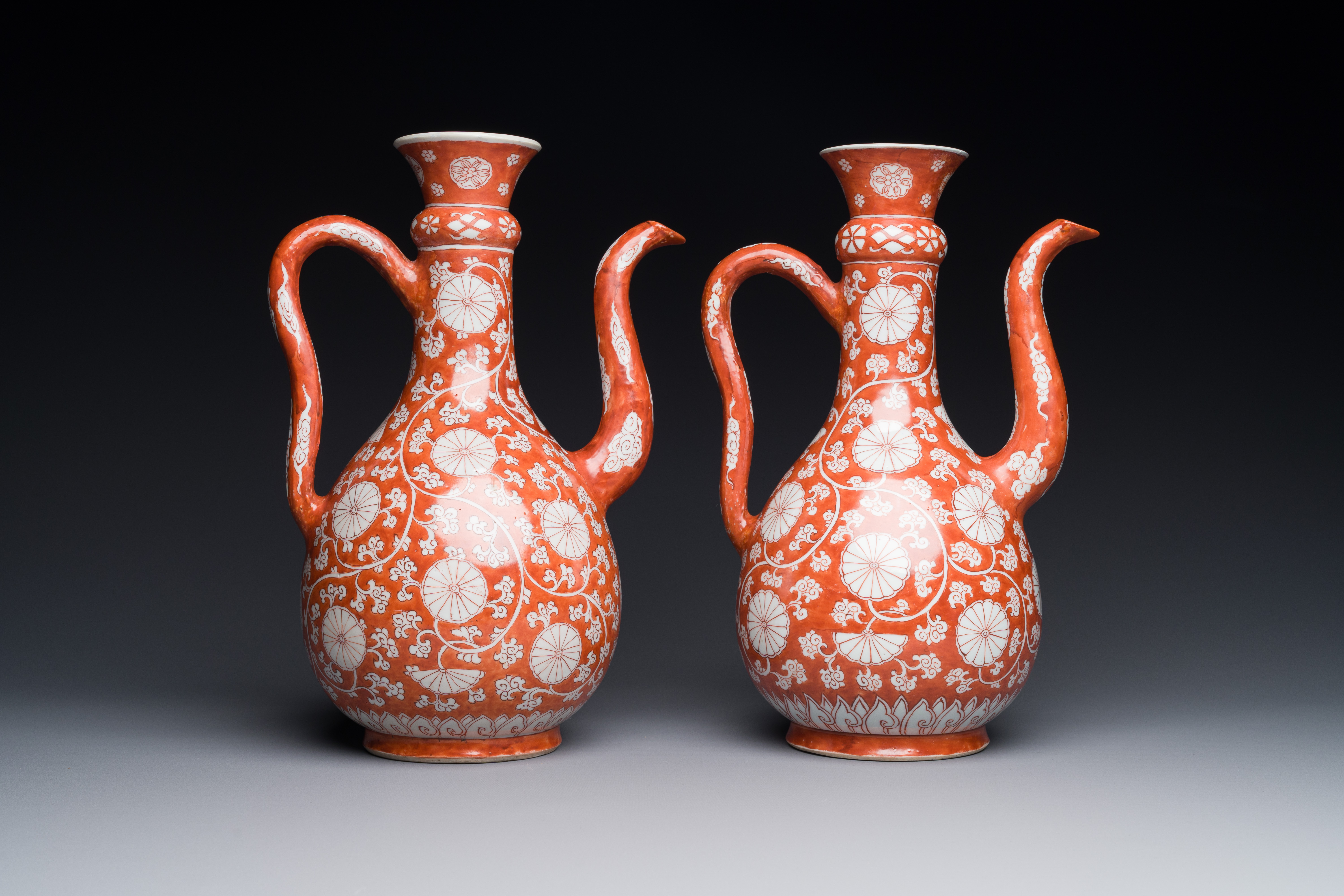 A pair of rare Chinese iron-red-enamelled 'chrysanthemum scroll' ewers, Kangxi - Image 4 of 7