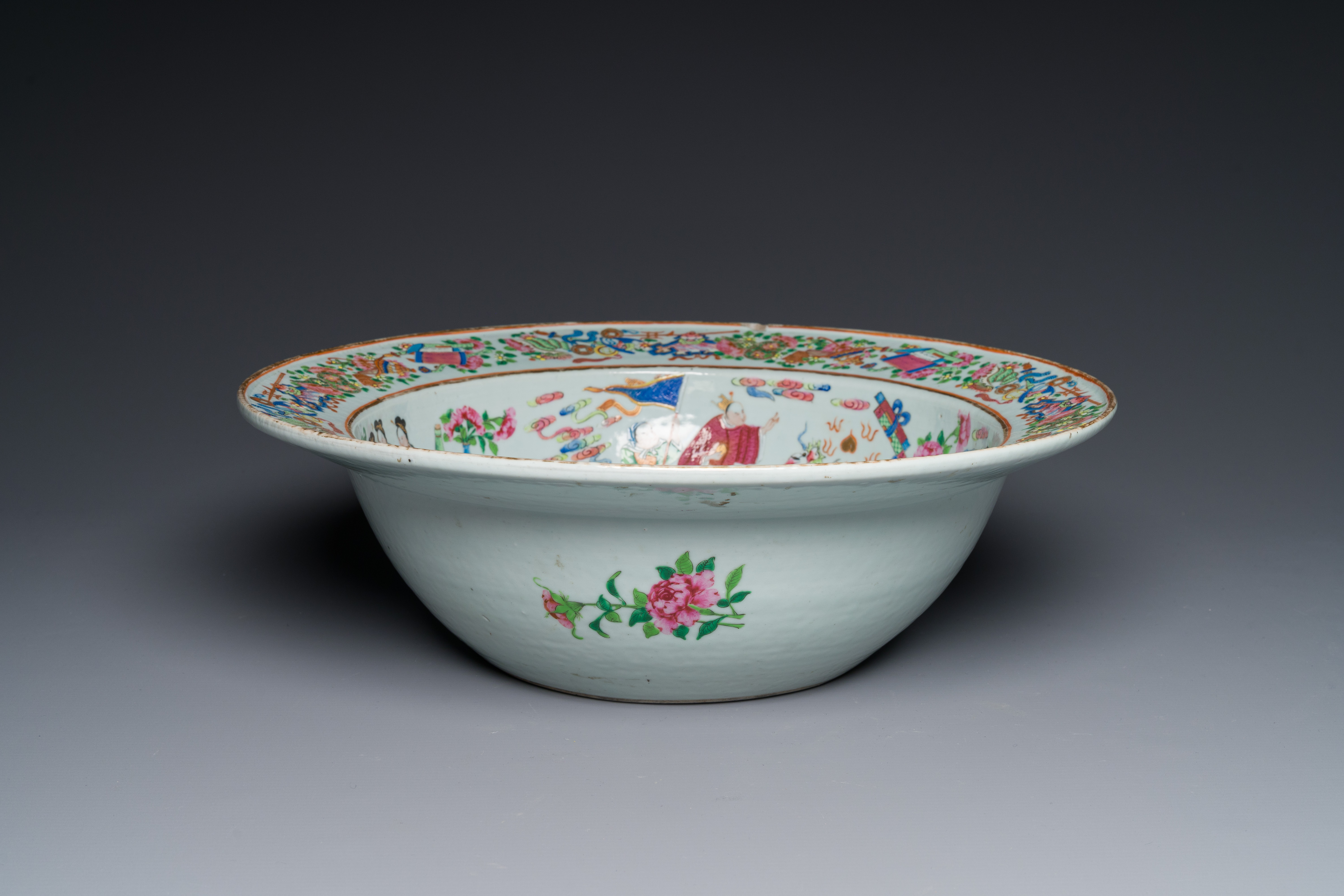 A large Chinese Canton famille rose 'Qi Lin Song Zi' basin, 19th C. - Image 2 of 5