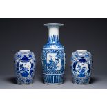 A pair of Chinese blue and white jars and a vase, Kangxi mark, 19th C.