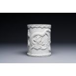 A Chinese monochrome white-glazed biscuit brush pot, signed Wang Bingrong çŽ‹ç‚³æ¦®, 19/20th C.