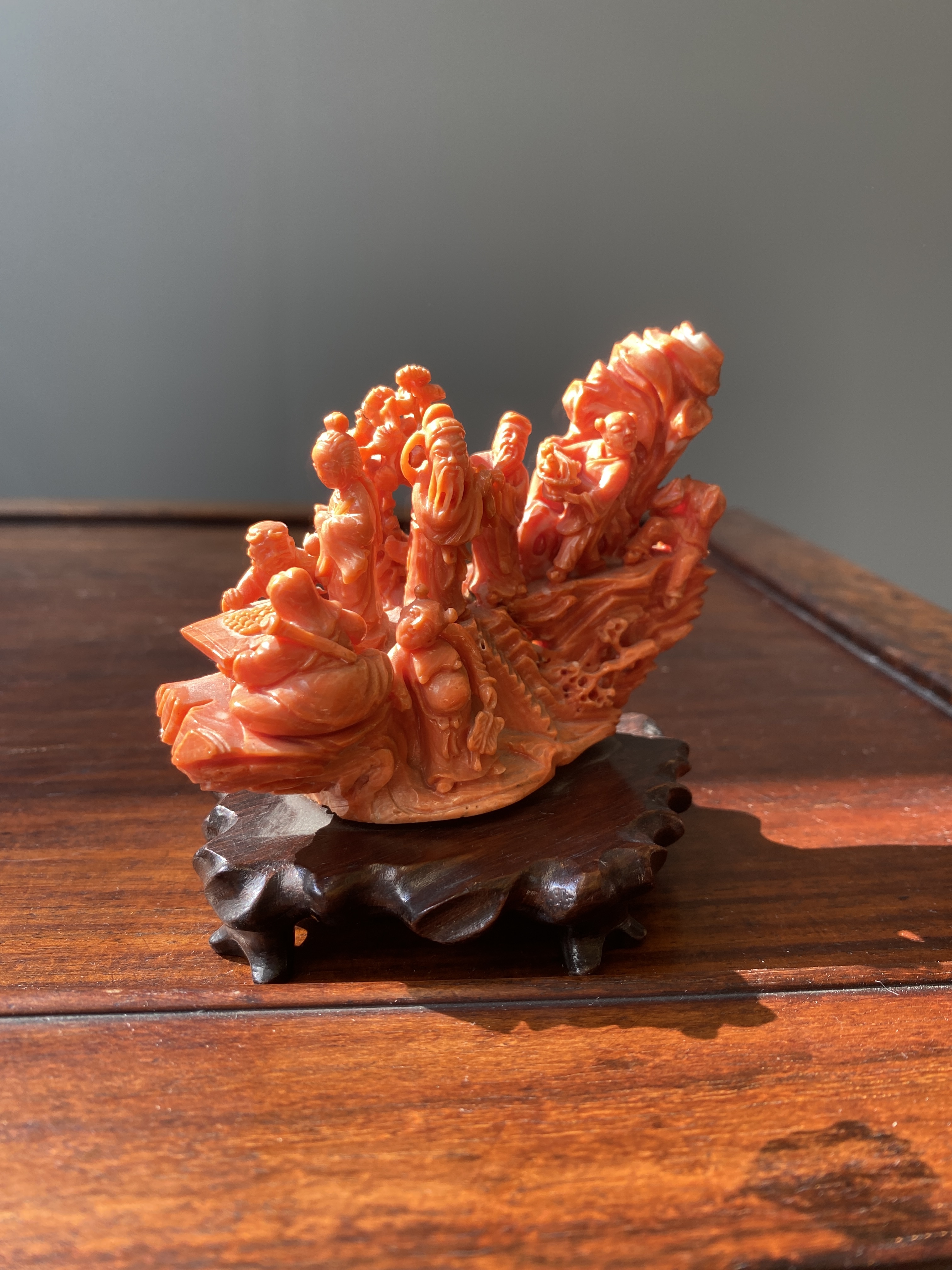 A Chinese red coral 'Eight Immortals' group on wooden stand, 19/20th C. - Image 7 of 14