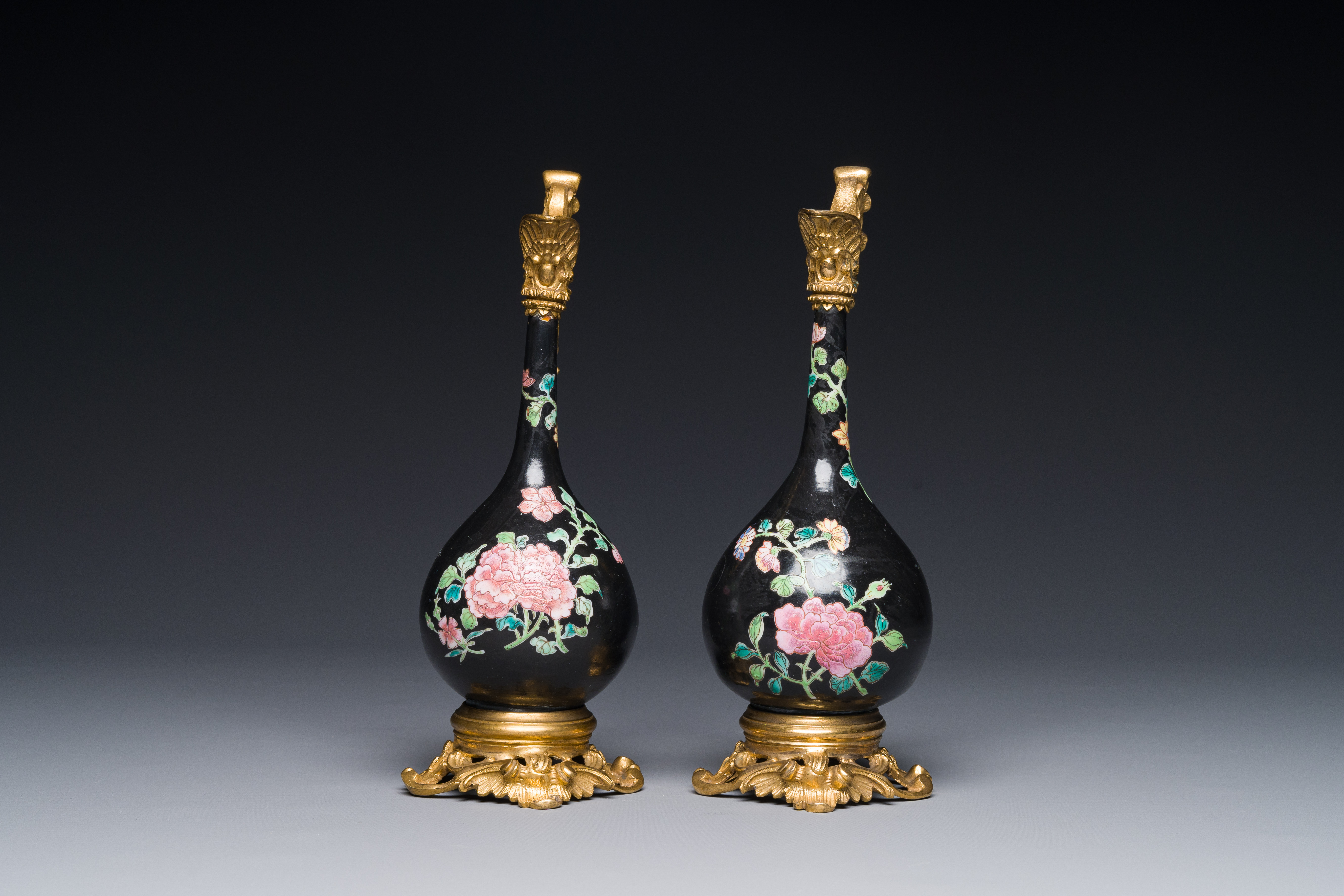 A pair of Chinese black-ground famille rose vases with gilt bronze mounts, Yongzheng - Image 2 of 4