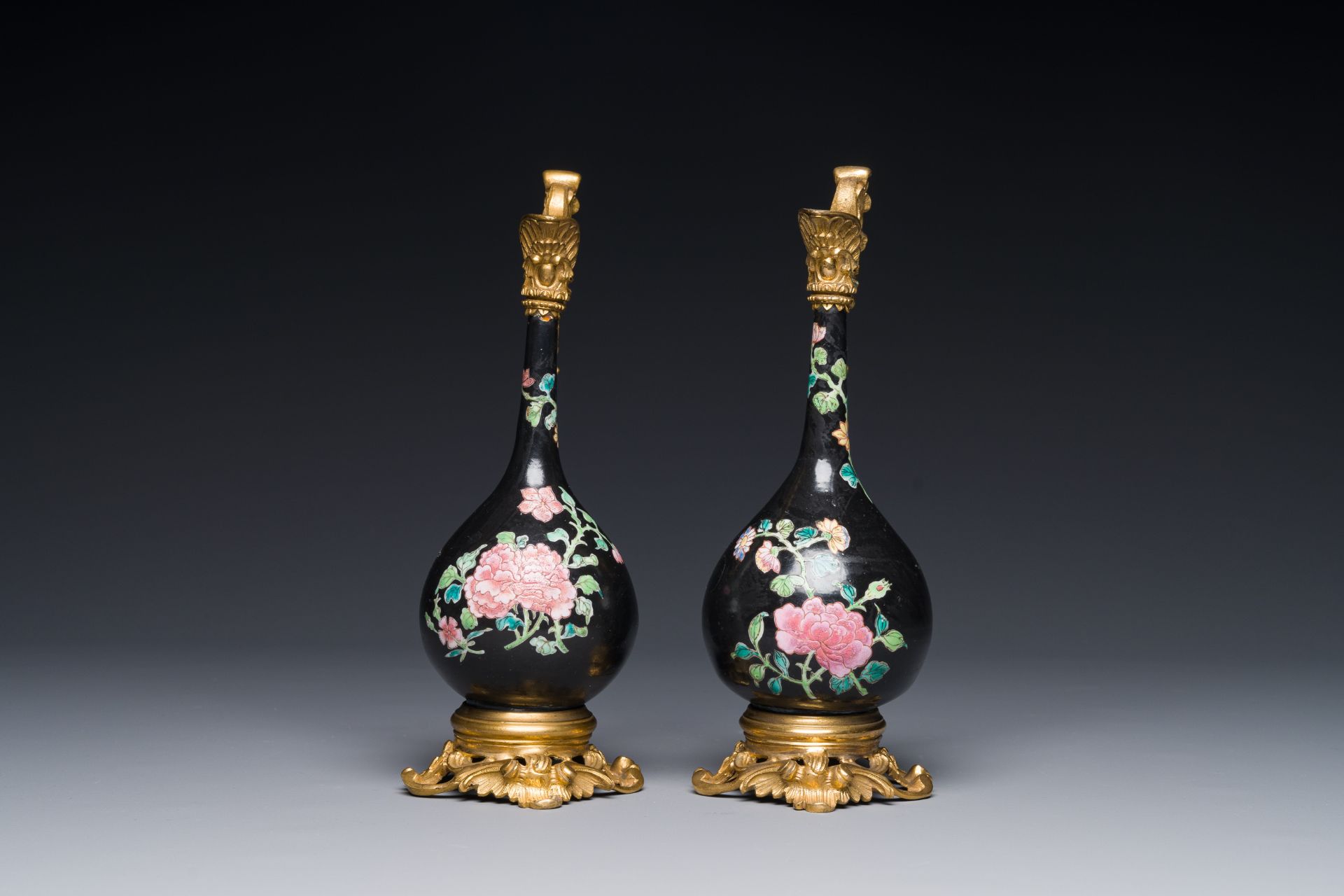 A pair of Chinese black-ground famille rose vases with gilt bronze mounts, Yongzheng - Image 2 of 4