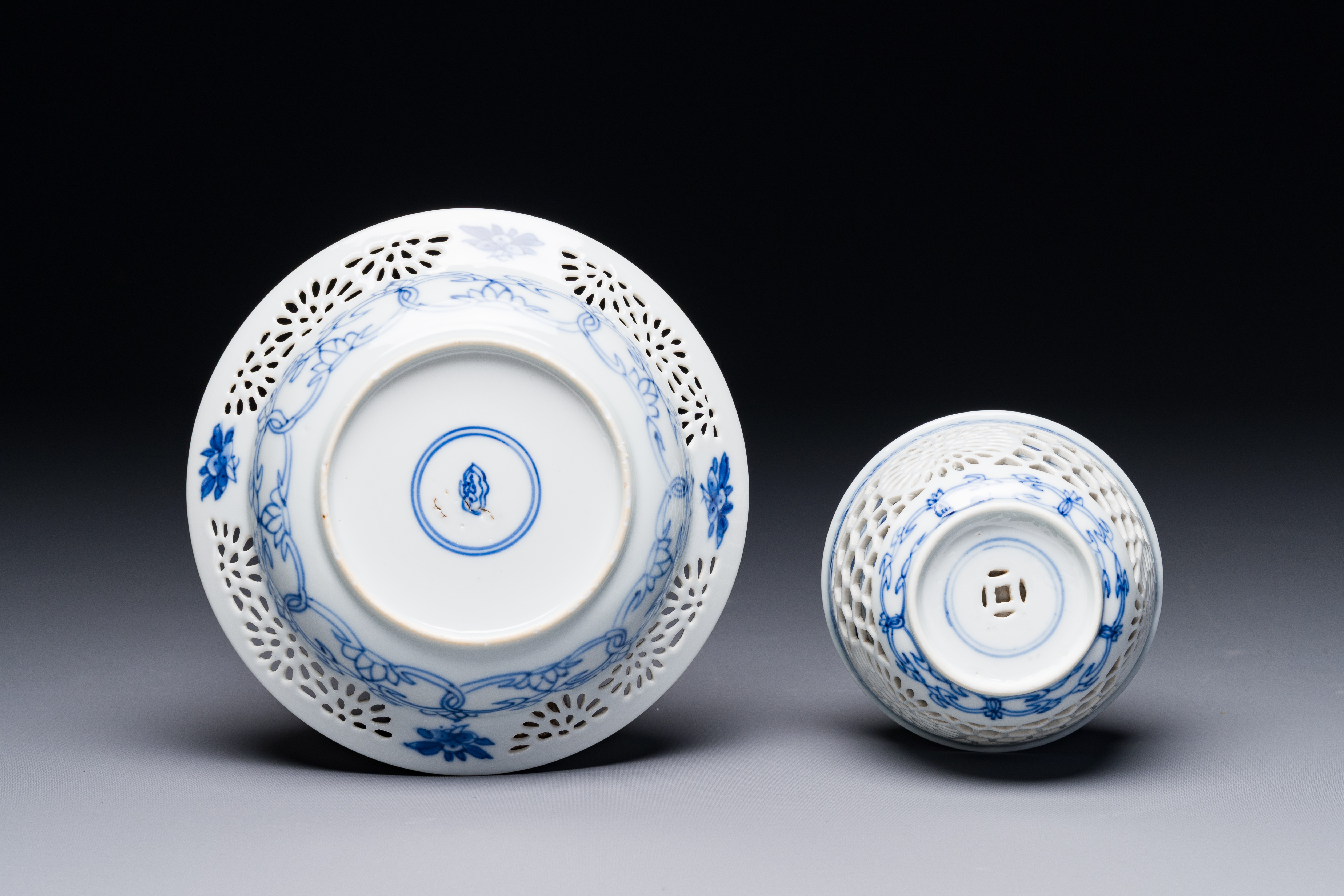 A Chinese blue and white reticulated double-walled cup and saucer, Kangxi - Image 4 of 4