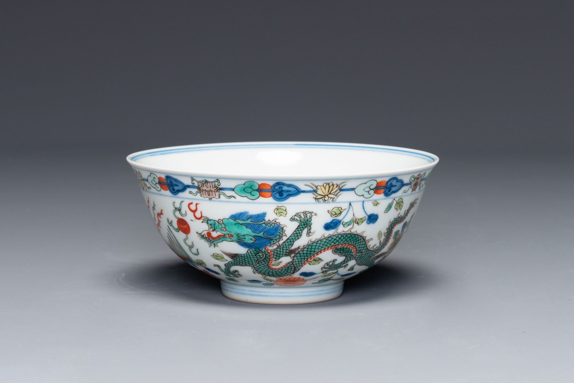 A Chinese wucai 'dragon and phoenix' bowl, Daoguang mark and of the period