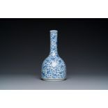 A Chinese blue and white 'lotus scroll' bottle vase, Yongzheng mark and possibly of the period