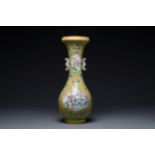 A Chinese Canton enamel yellow-ground vase, 19th C.