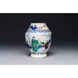 A Chinese wucai vase with figures and calligraphy, Transitional period