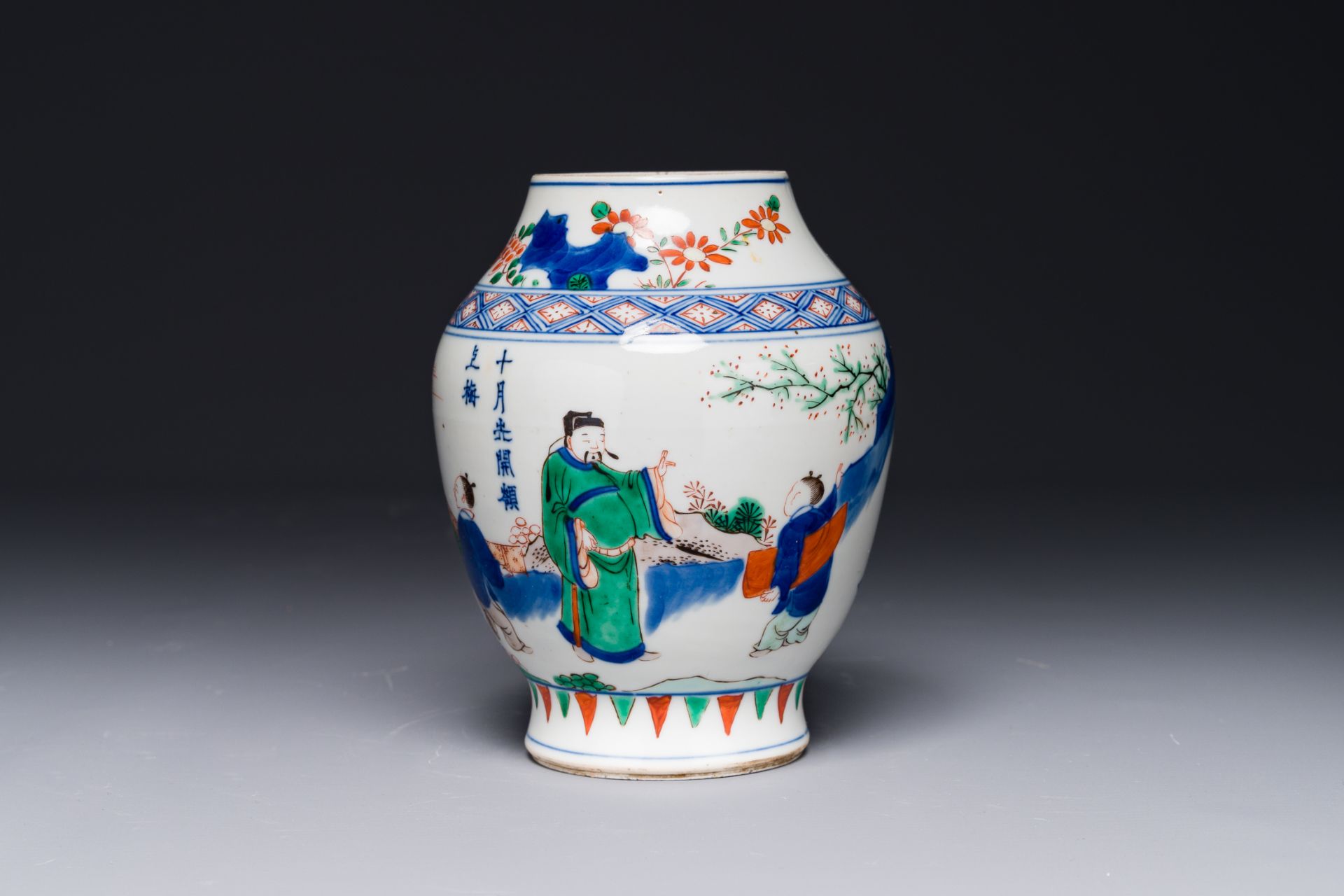 A Chinese wucai vase with figures and calligraphy, Transitional period