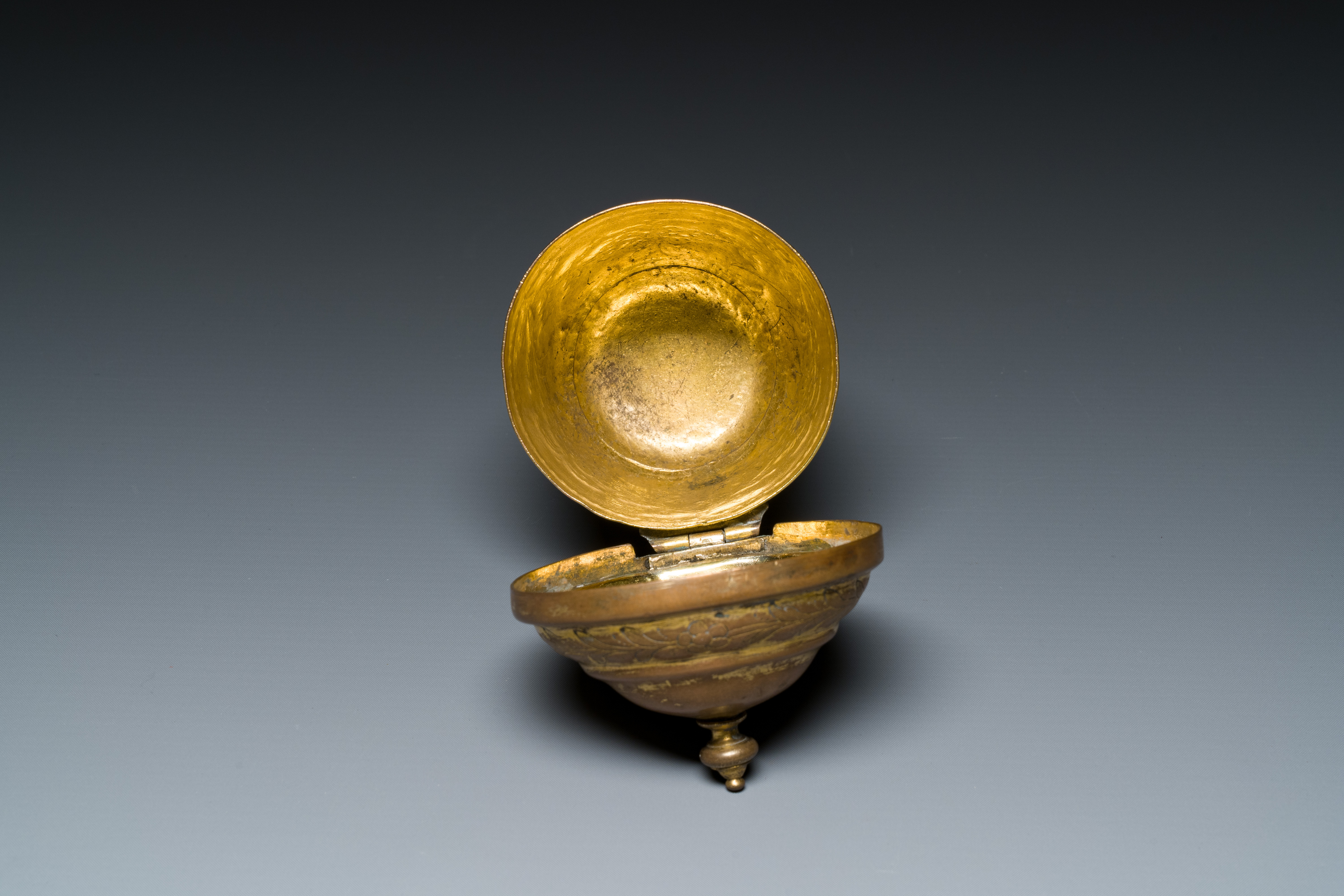 A gilt copper bowl and cover, 'tombak', Turkey, 18th C. - Image 8 of 9