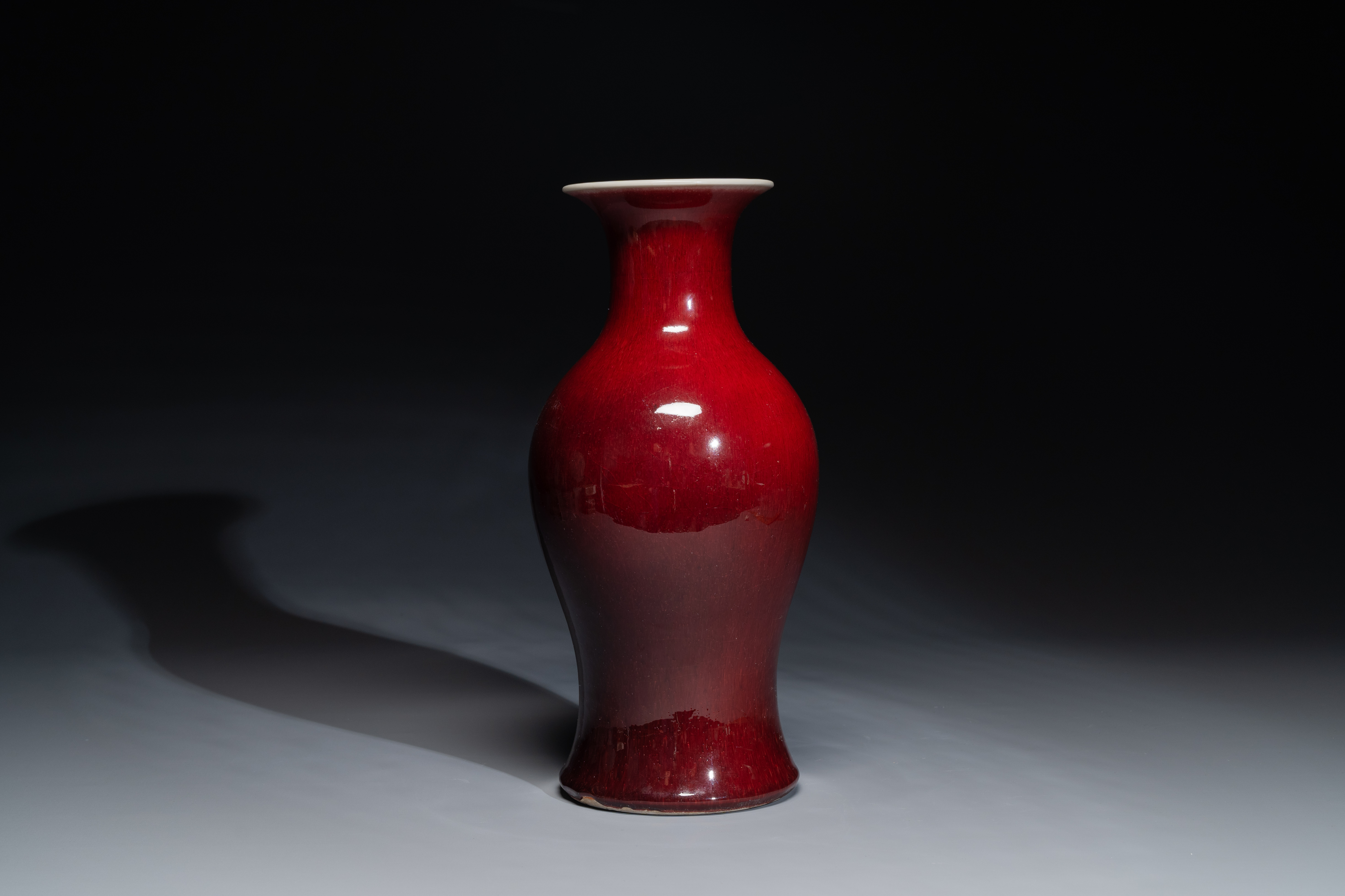 A Chinese monochrome copper-red-glazed vase, 19th C. - Image 2 of 4