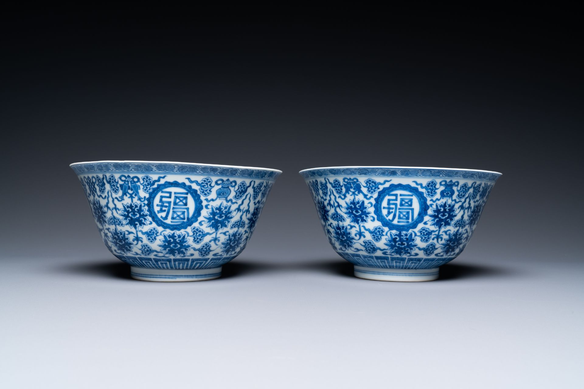 A pair of Chinese blue and white 'wan shou wu jiang' bowls, Qianlong mark and of the period - Image 3 of 40