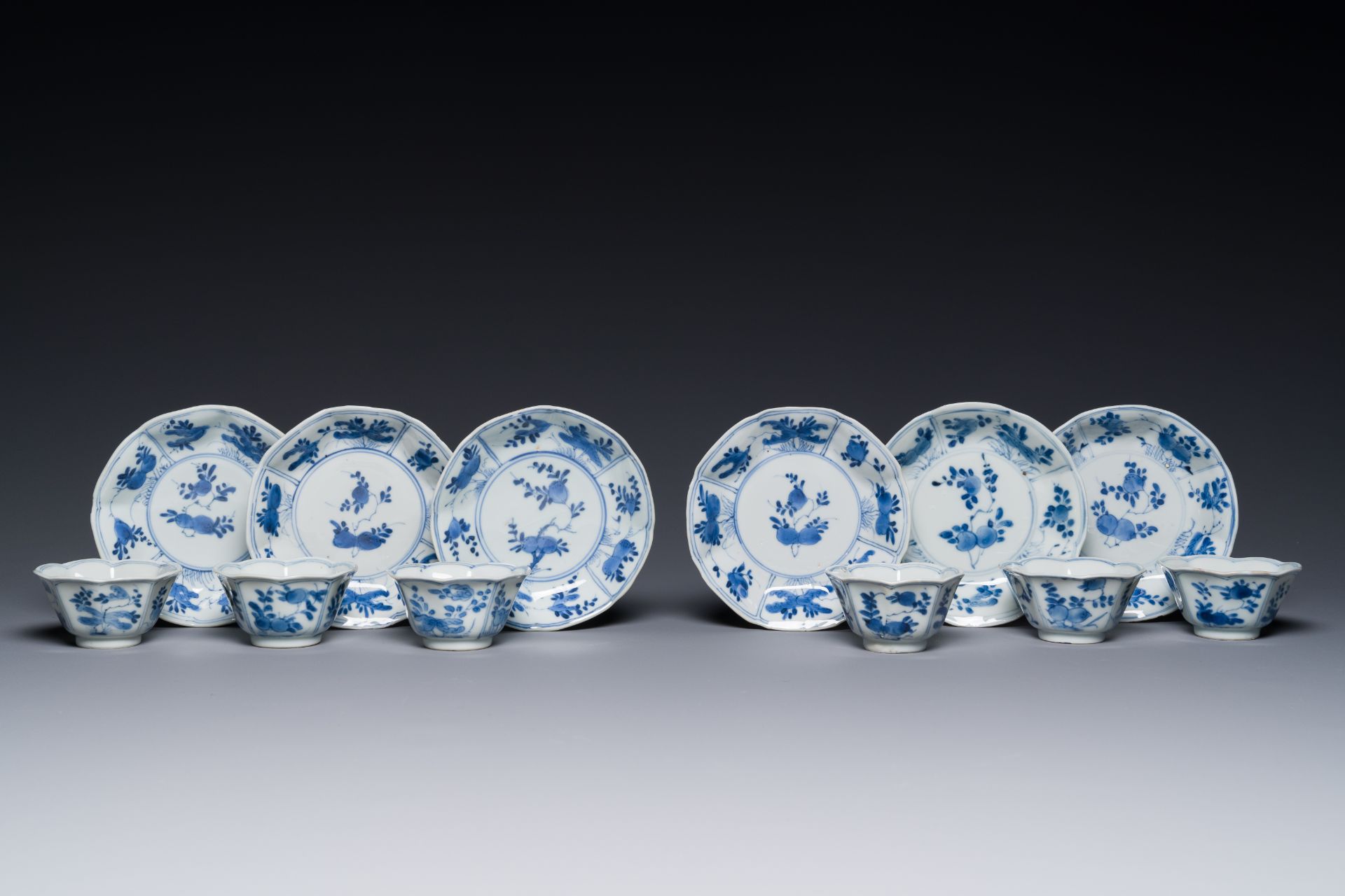 Six Chinese blue and white flower-shaped 'sanduo' cups and saucers, lingzhi mark, Kangxi