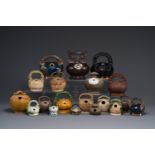 A large collection of nineteen Vietnamese stoneware lime pots, 14th C. and later