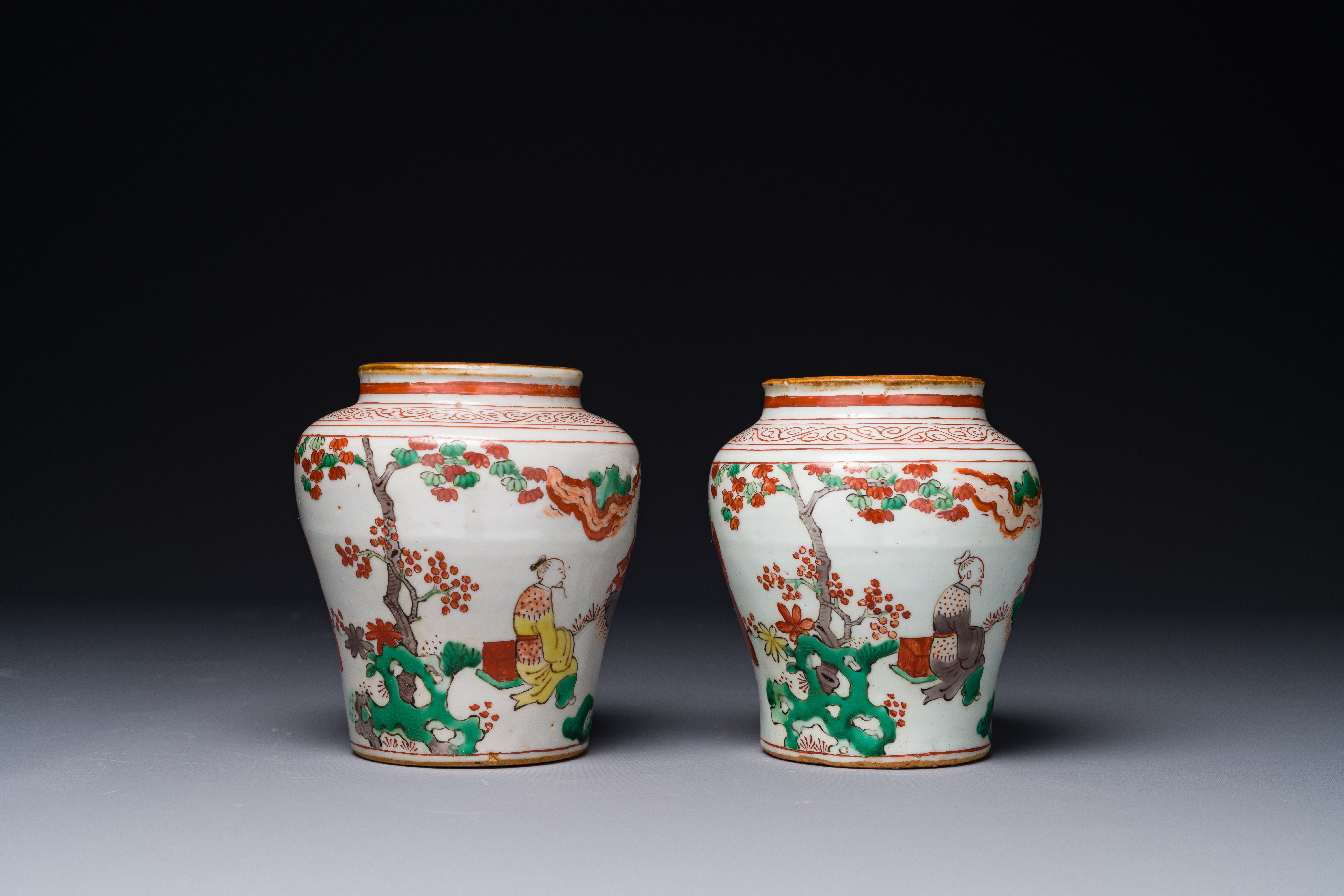 A pair of small Chinese wucai jars with figures in a landscape, Transition period - Image 4 of 6