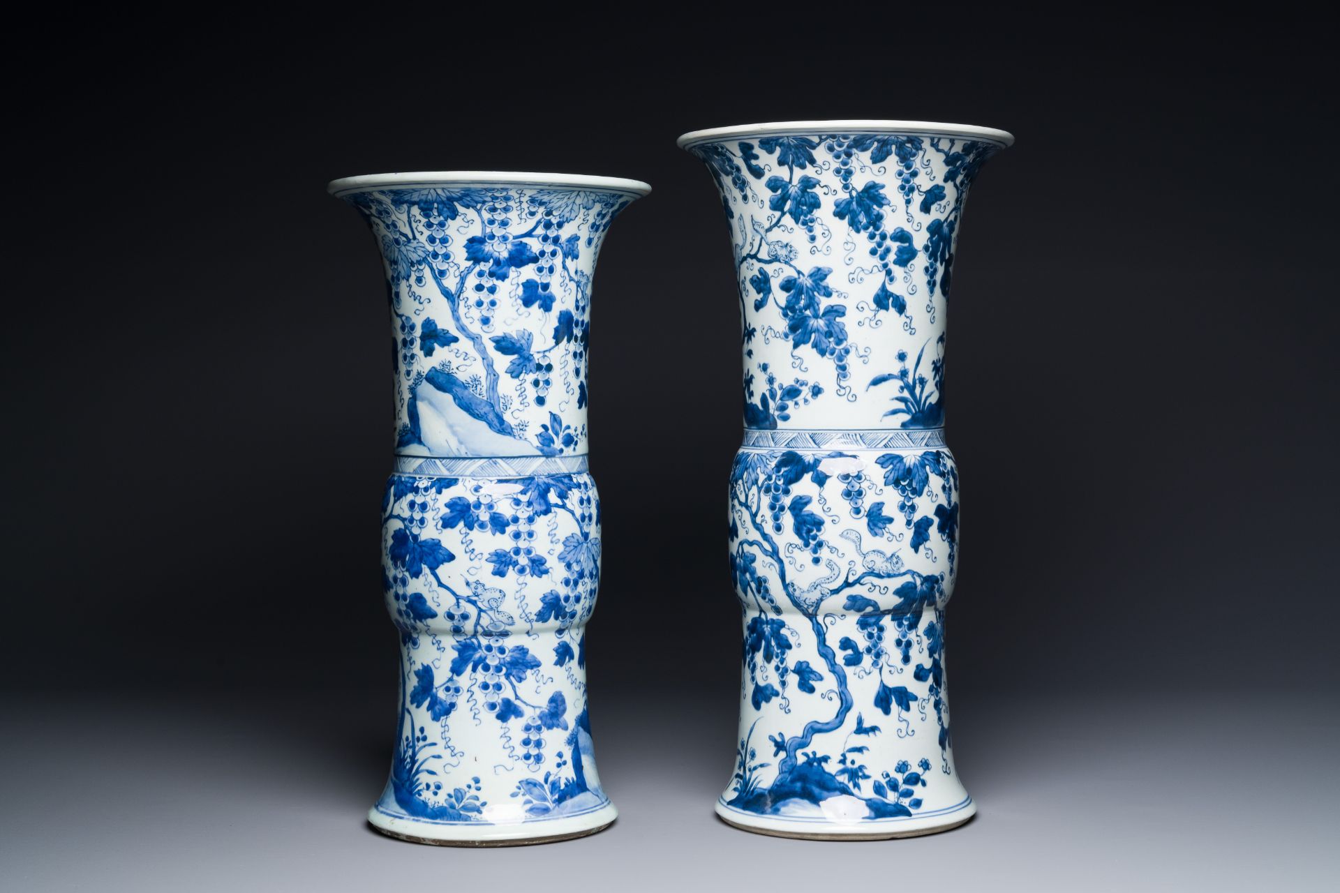 Two Chinese blue and white 'gu' vases with squirrels among grape vines, Kangxi - Image 4 of 7