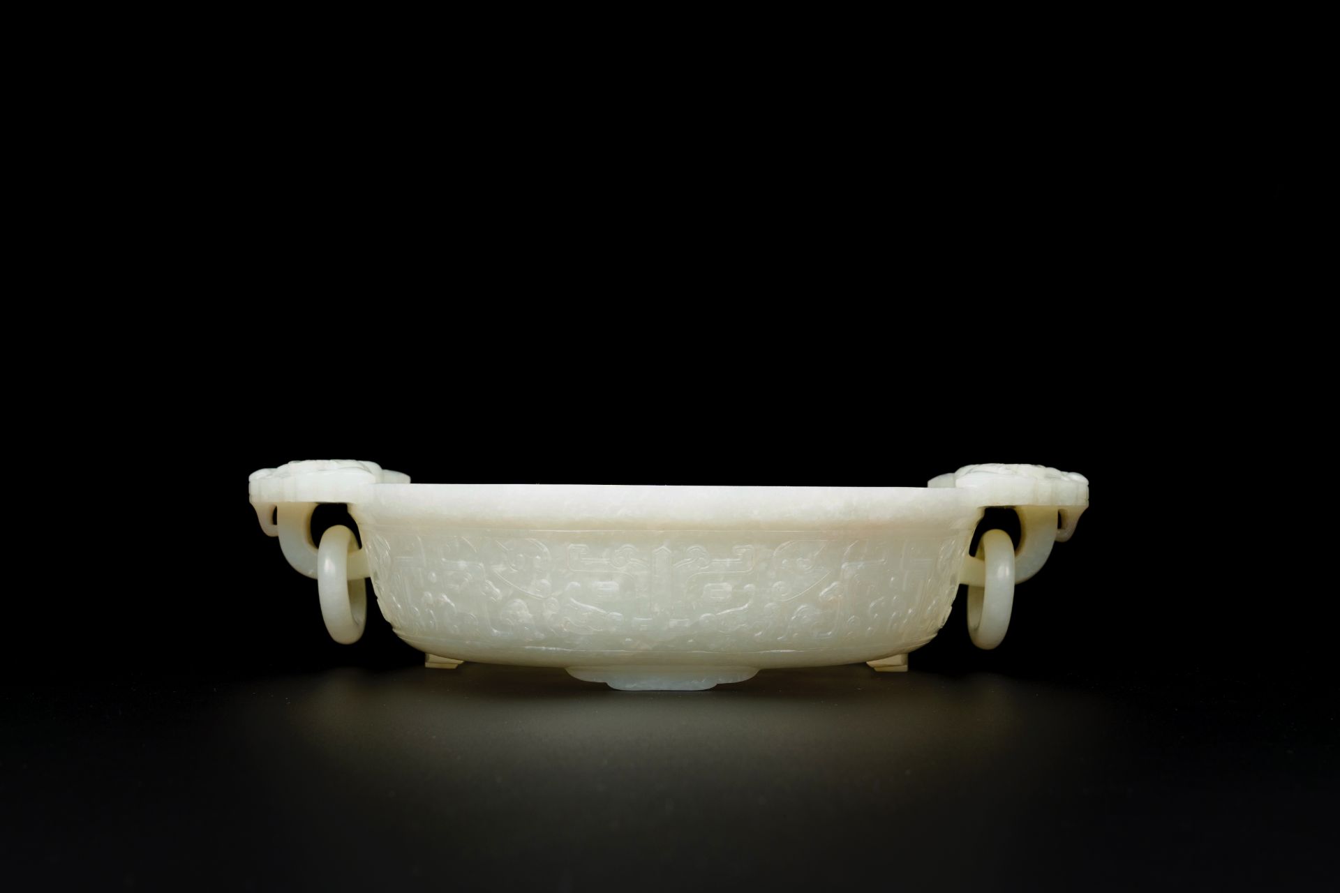 An important Chinese chrysanthemum-shaped very pale celadon jade marriage bowl, 18th C. - Image 4 of 8