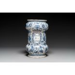 A large Italian blue, white and manganese albarello drug jar inscribed Charitas, probably Savona