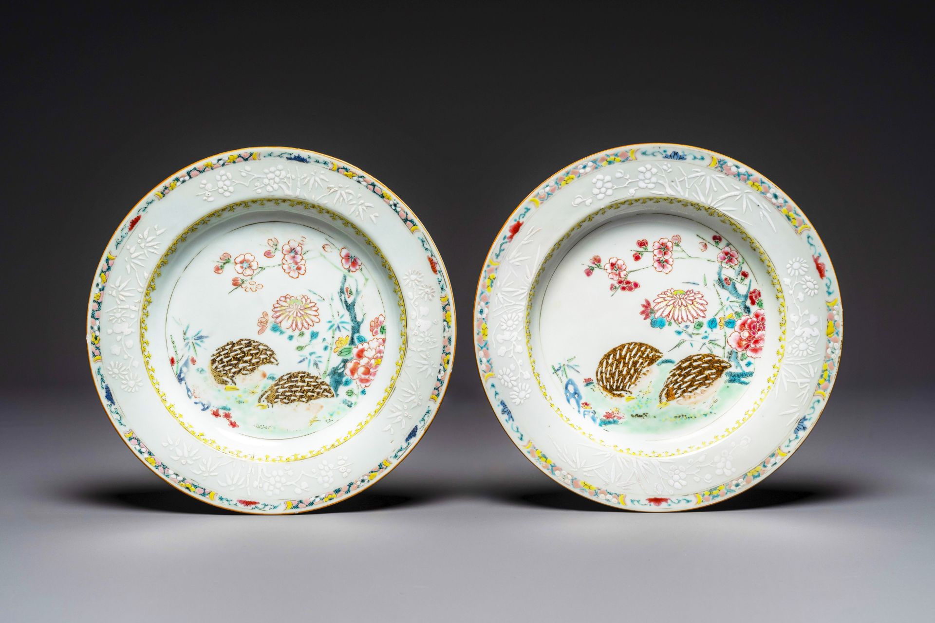 A pair of Chinese famille rose 'quail' plates, Yongzheng