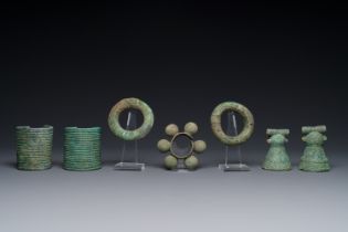 A collection of bronze bracelets and animal bells, Vietnam and Cambodia, 4th/1st C. B.C