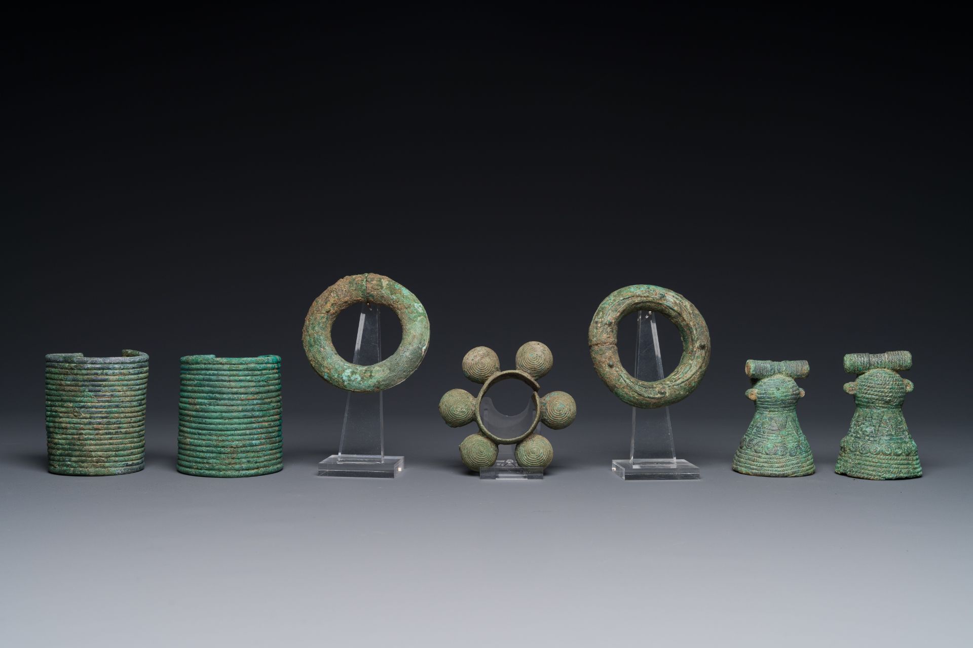 A collection of bronze bracelets and animal bells, Vietnam and Cambodia, 4th/1st C. B.C