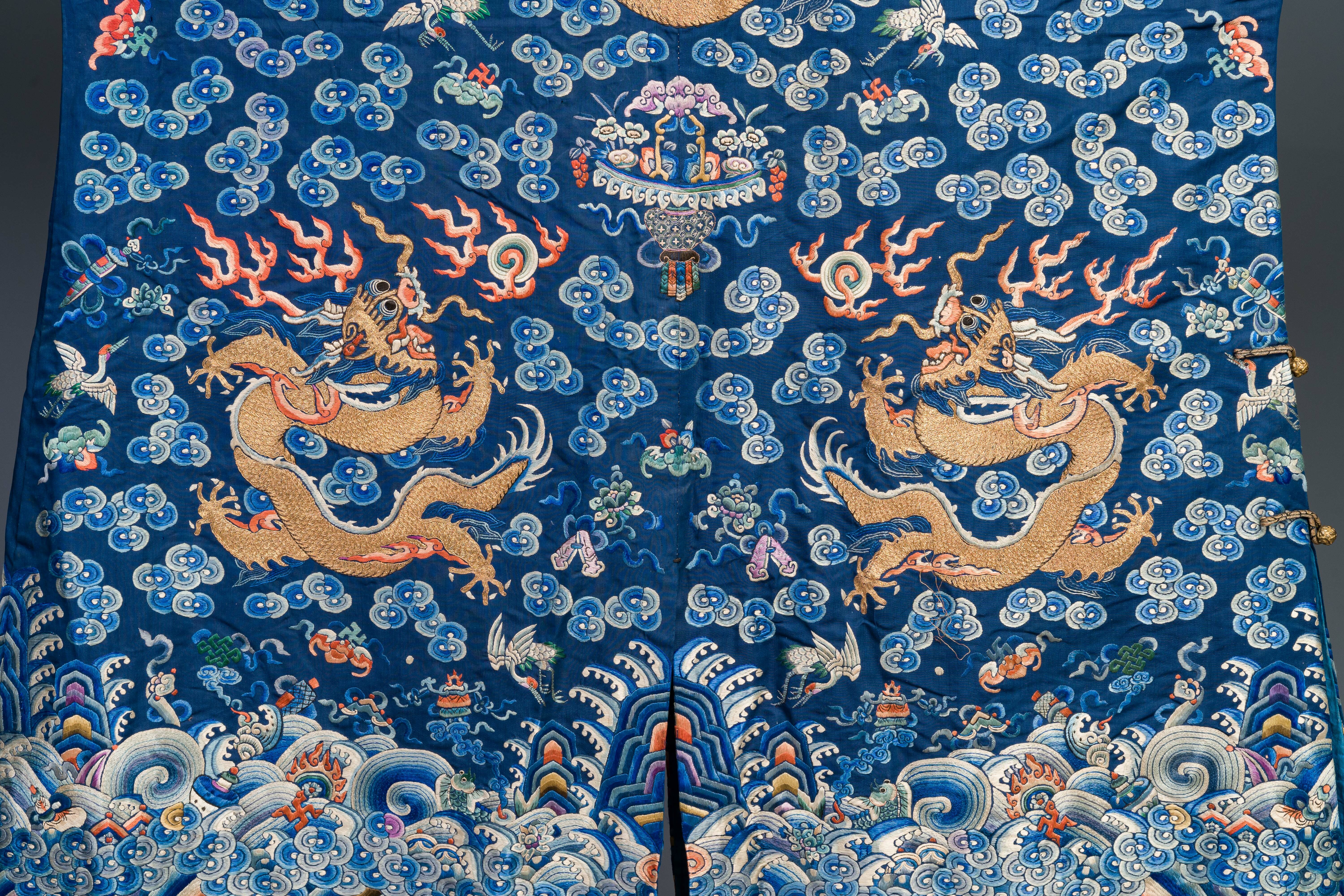 A Chinese gold thread embroidered blue-ground silk 'dragon' robe, 19th C. - Image 5 of 7