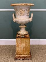 CAST IRON GARDEN URN ON PLINTH, Handyside & Co, Derby & London, the urn of campana form on stepped