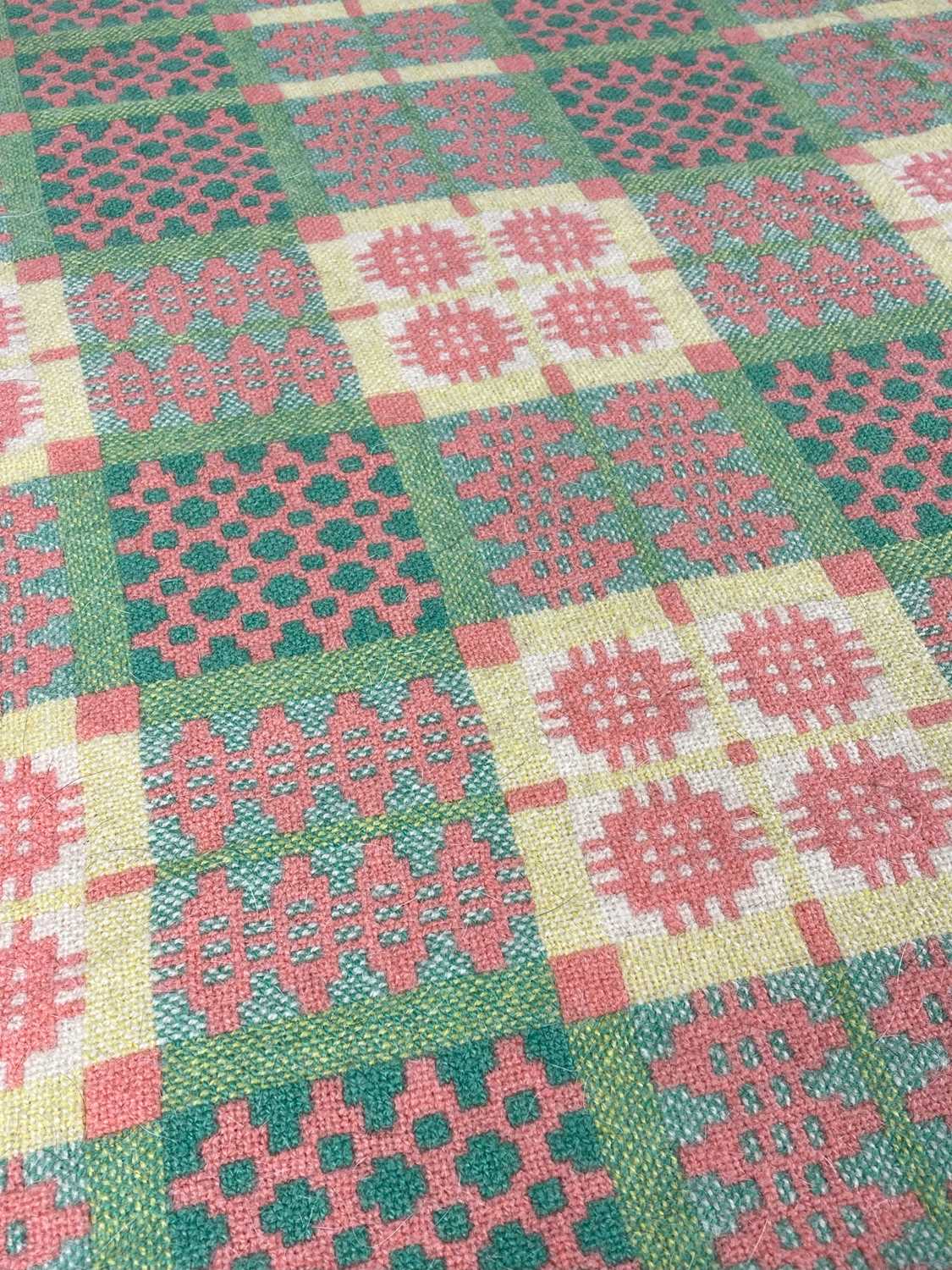 VINTAGE TRADITIONAL WELSH WOOLLEN BLANKET with yellow and pink geometric design to a geen ground,