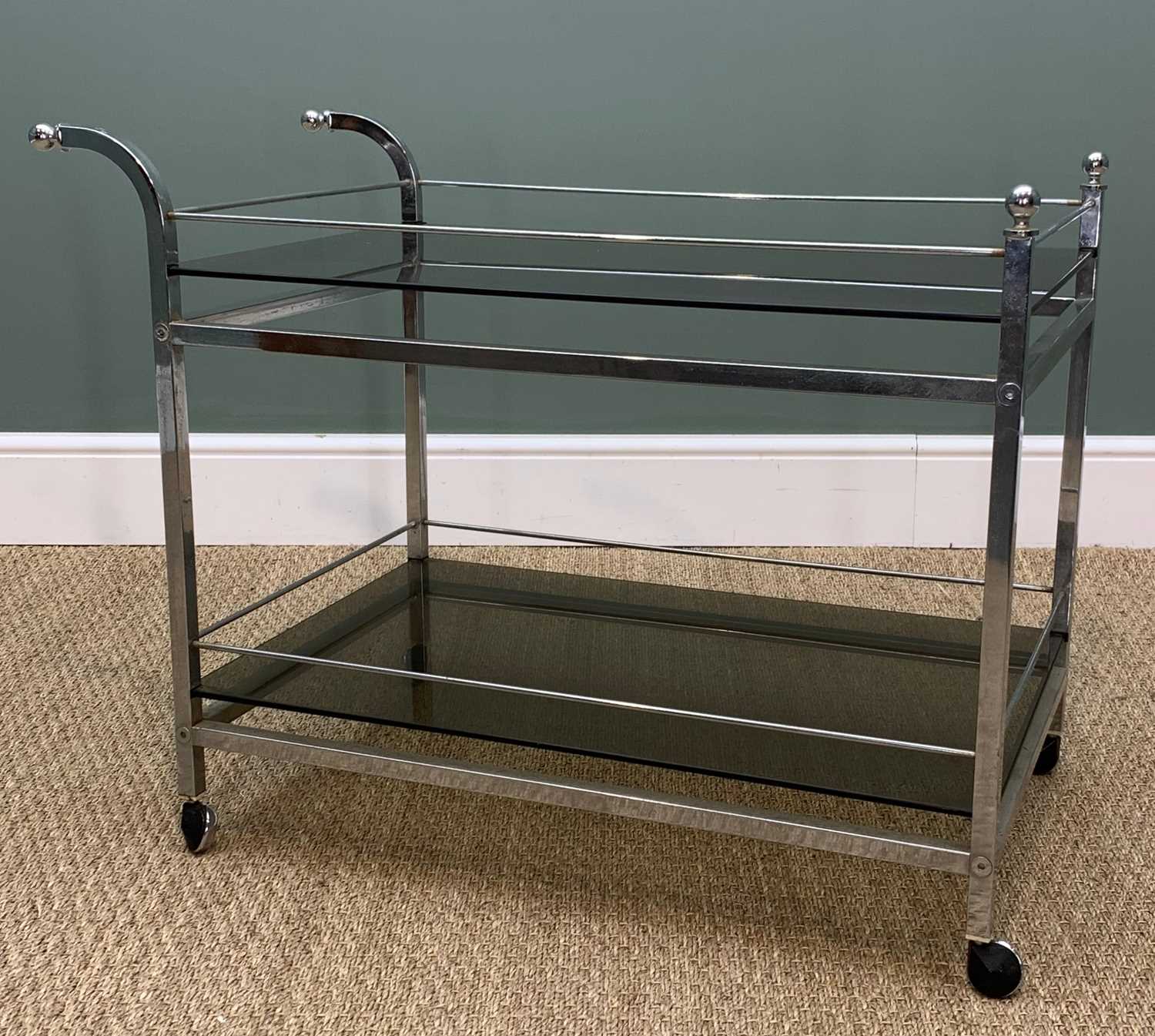 VINTAGE CHROME AND GLASS DRINKS TROLLEY, circa 1970s, smokey glass trays within rails, castors, - Image 2 of 3